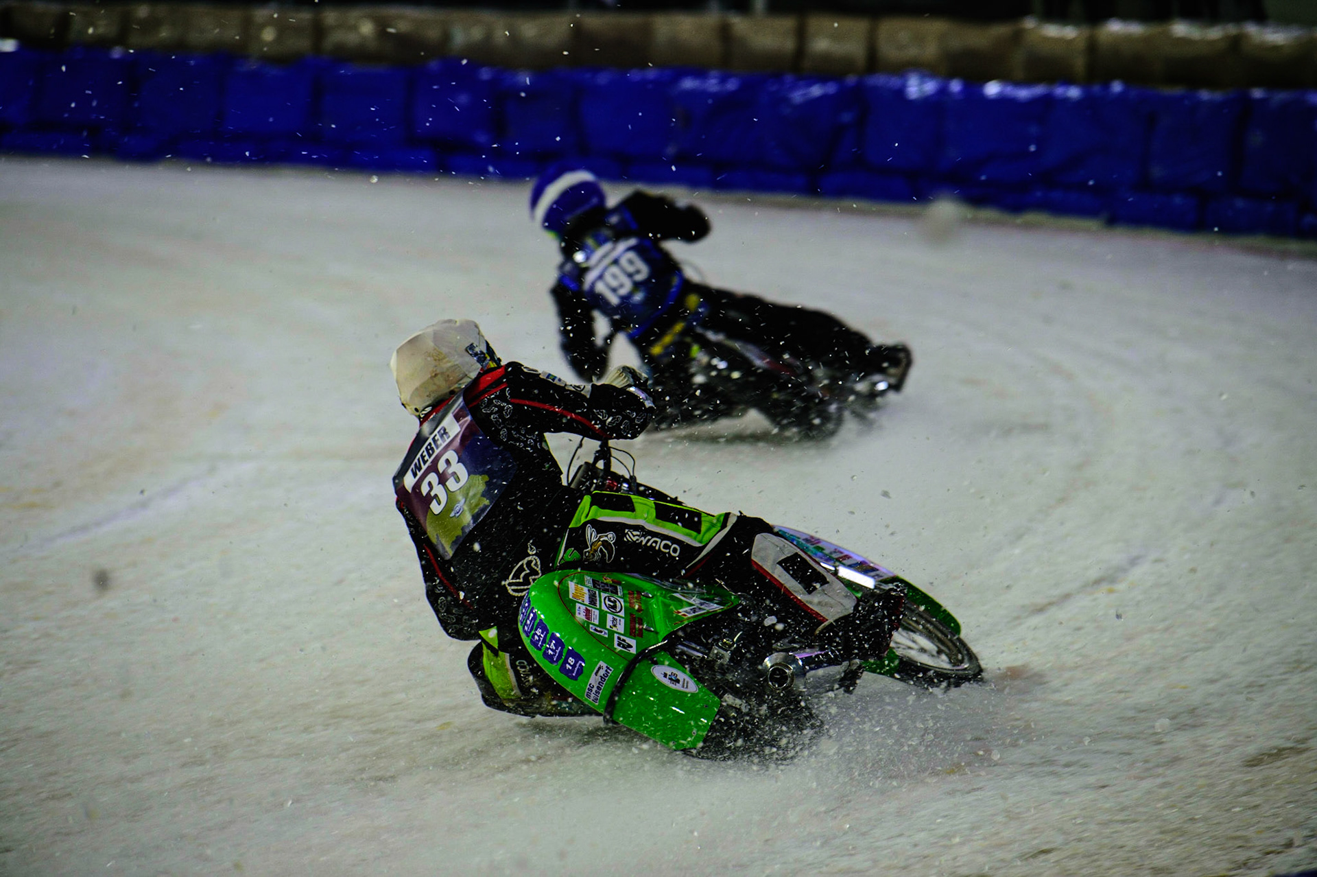 HEERENVEEN, NL. Johann Weber (33)  chases Martin Hååruhiltunen (199)  during the FIM Ice Speedway Gladiators World Championship Final 4 at Ice Rink Thialf, Heerenveen on Sunday  3 April 2022. (Credit: Ian Charles | MI News)