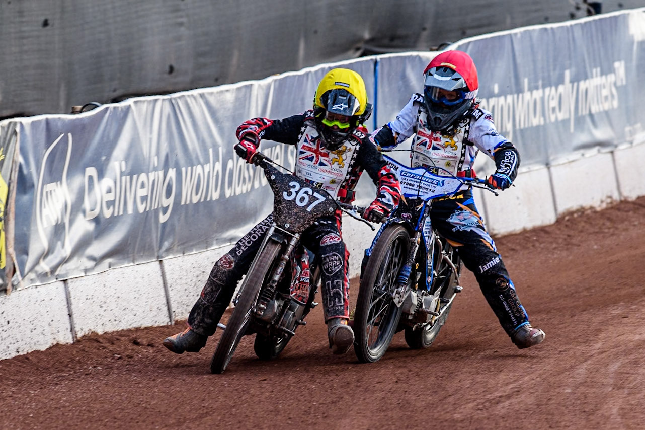 Charlie Luckman (125cc) in Yellow \tangles with Reuben Marsh (125cc) in Red during the British Youth 250cc Championships at the National Speedway Stadium, Manchester on Friday 30th August 2024. (Photo: Ian Charles | MI News)