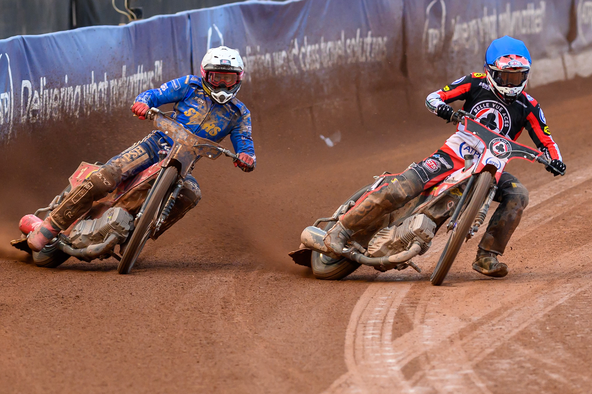 Zach Cook of Belle Vue Aces in Blue rides inside Max Fricke of Kings Lynn Stars in White  during the Rowe Motor Oil Premiership match between Belle Vue Aces and King's Lynn Stars at the National Speedway Stadium, Manchester on Monday 29th June 2026. (Photo: Ian Charles | MI News)