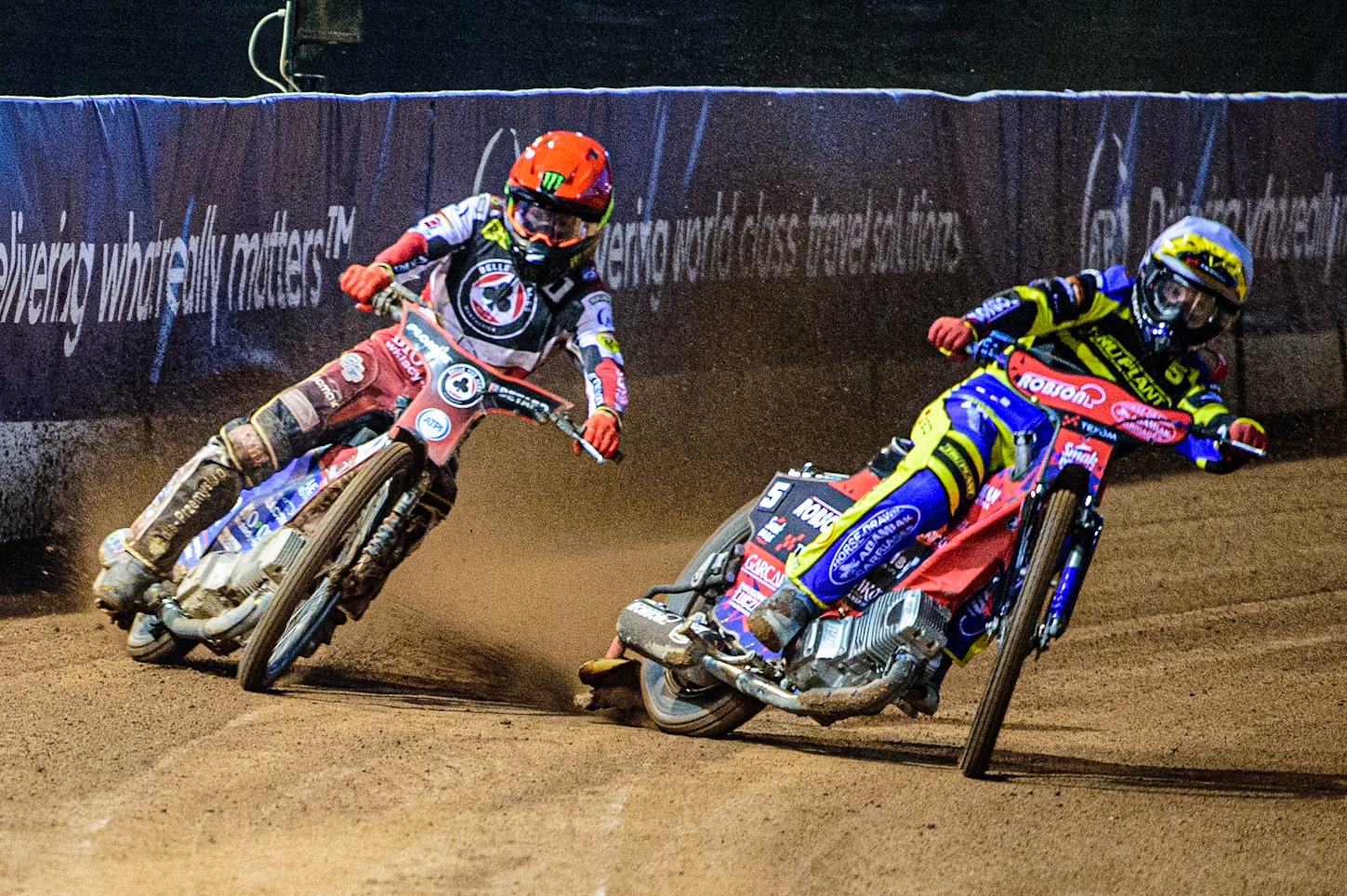 Dan Bewley  (Red) outside Tobiasz Musielak  (White) during the SGB Premiership match between Belle Vue Aces and Sheffield Tigers at the National Speedway Stadium, Manchester on Monday 27th March 2023. (Photo: Ian Charles | MI News)