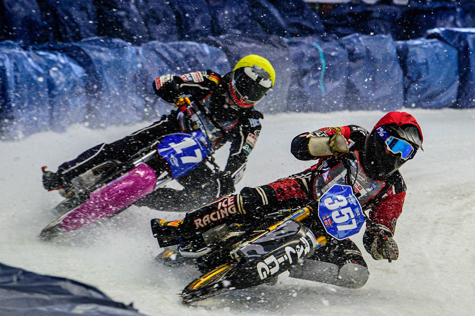 Jo Saetre (357) (Red) holds out Benedikt Monn (17) (Yellow) during the Ice Speedway Gladiators World Championship Final 2 at Max-Aicher-Arena, Inzell, Germany on Sunday 19th March 2023. (Photo: Ian Charles | MI News)