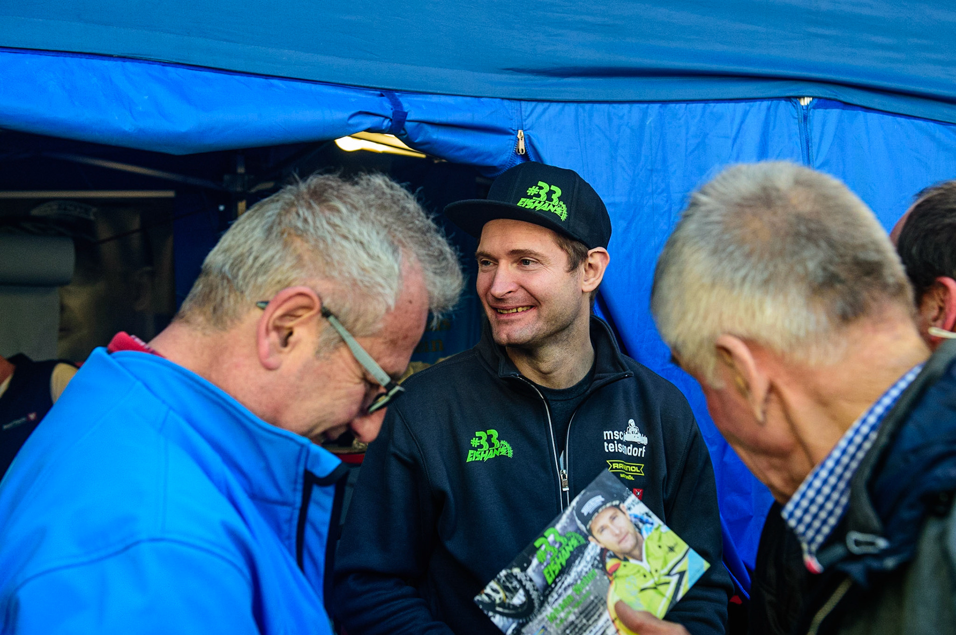 Johann Weber (16) (Germany) with fans before the meeting during the Ice Speedway Gladiators World Championship Final 1 at Max-Aicher-Arena, Inzell, Germany on Saturday 18th March 2023. (Photo: Ian Charles | MI News)