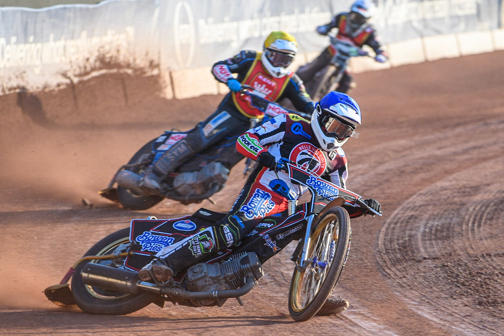 Paul Bowen (Blue) leads Tom Woolley (Yellow) and Connor King (White) during the National Development League match between Belle Vue Colts and Kent Royals at the National Speedway Stadium, Manchester on Friday 7th July 2023. (Photo: Ian Charles | MI News)