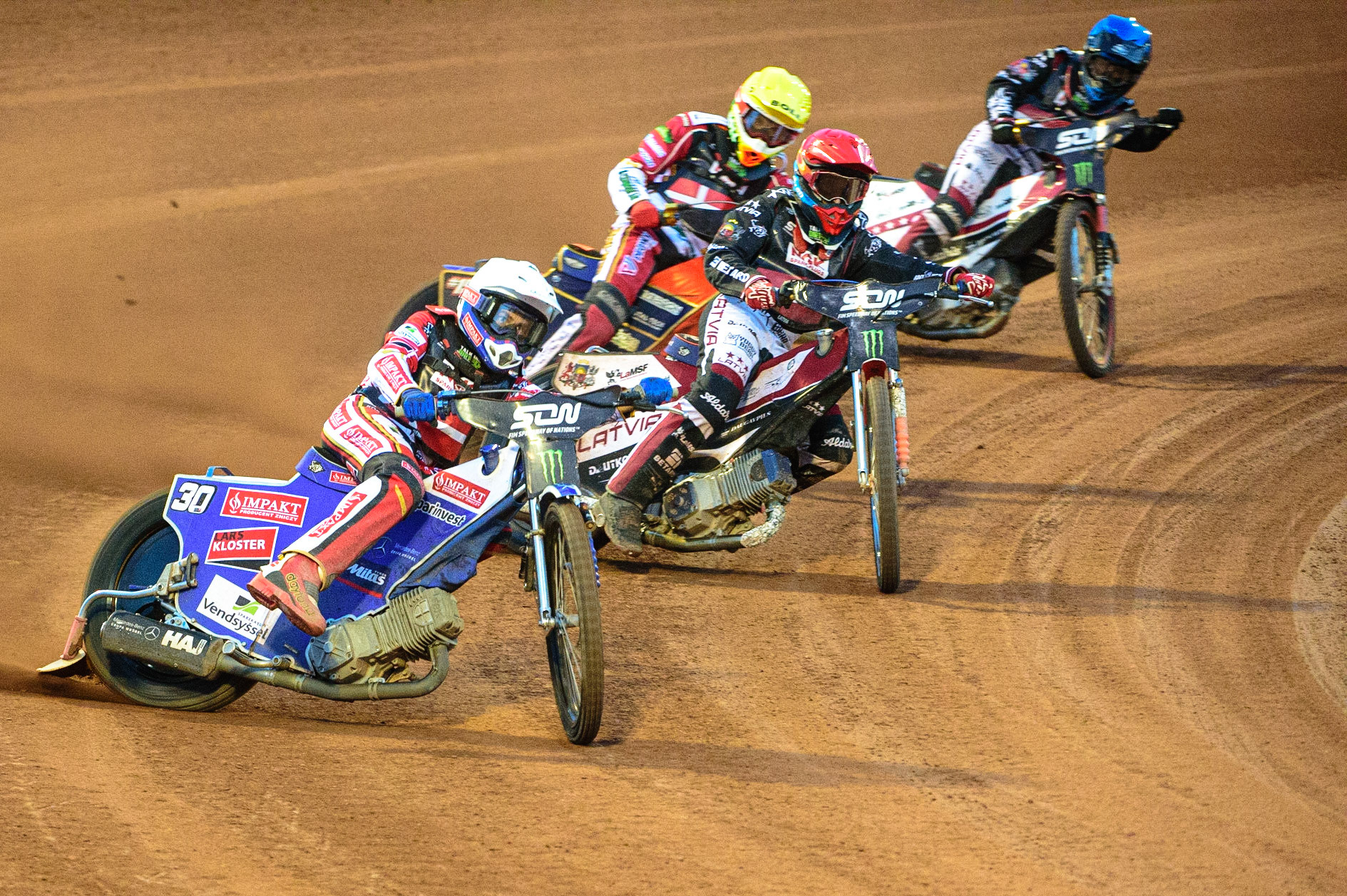 MANCHESTER, UK. OCT 16TH Leon Madsen of Denmark (White) leads Andzejs Lebedevs of Latvia (Red), Mikkel Michelsen of Denmark (Yellow) and Olegs Mijailovs of Latvia (Blue) during the Monster Energy FIM Speedway of Nations at the National Speedway Stadium, Manchester on Saturday  16th October 2021. (Credit: Ian Charles | MI News)