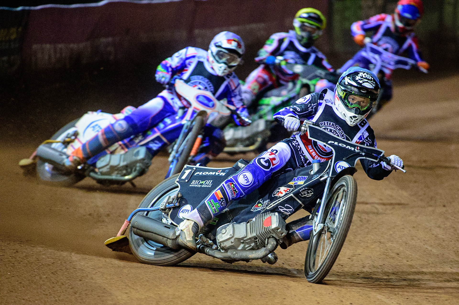 MANCHESTER, UK. OCT 23RD  Dan Bewley (Blue) leads Jason Crump (White), Charles Wright  (Yellow) and Jordan Palin  (Red) during the Peter Craven Memorial Trophy event at the National Speedway Stadium, Manchester on Saturday 23rd October 2021. (Credit: Ian Charles | MI News)