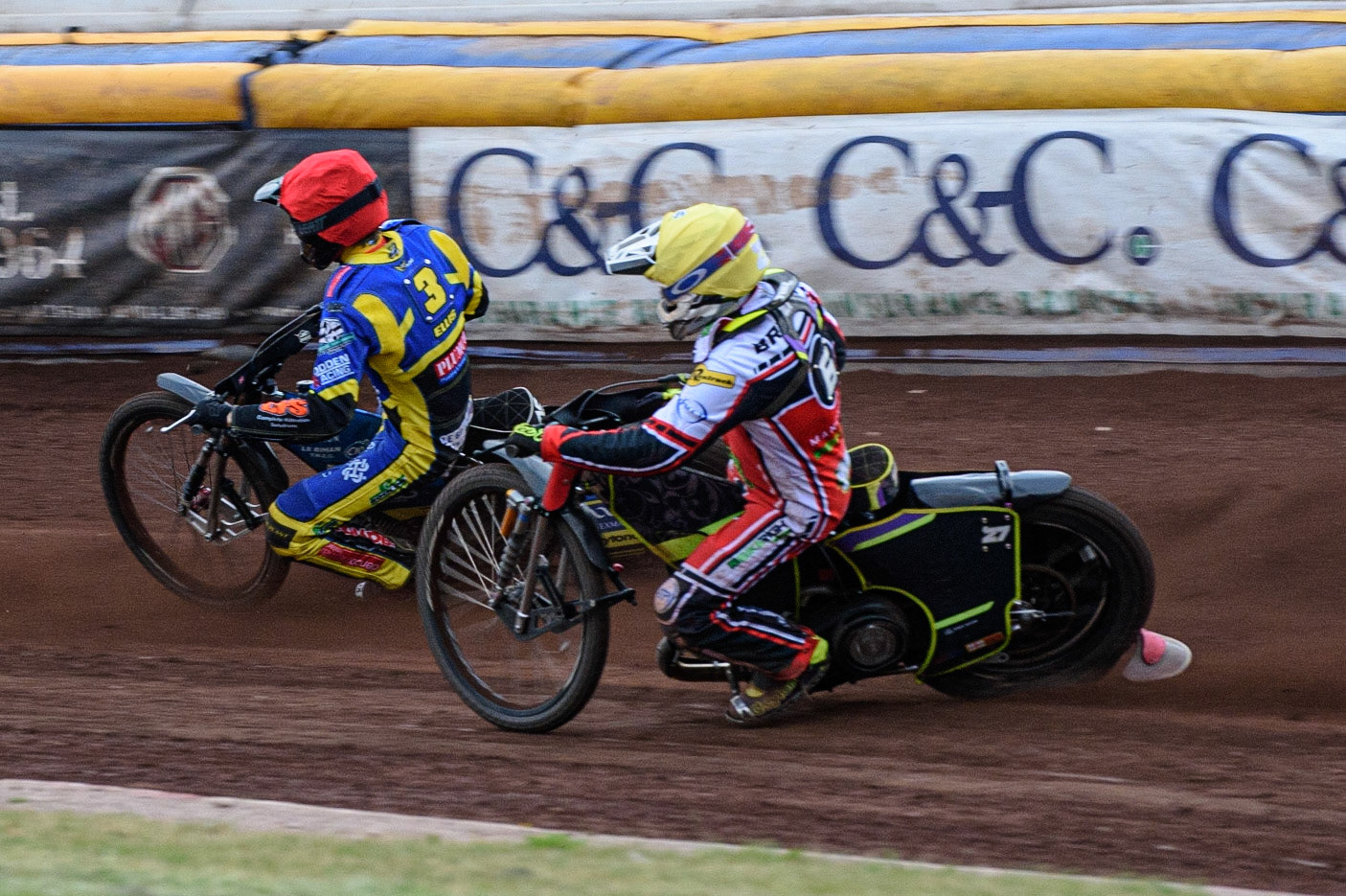 SHEFFIELD, UK. JULY 1ST     Adam Ellis  (Red) leads Tom Brennan  (Yellow) during the SGB Premiership match between Sheffield Tigers and Belle Vue Aces at Owlerton Stadium, Sheffield on Thursday 1st July 2021. (Credit: Ian Charles | MI News)