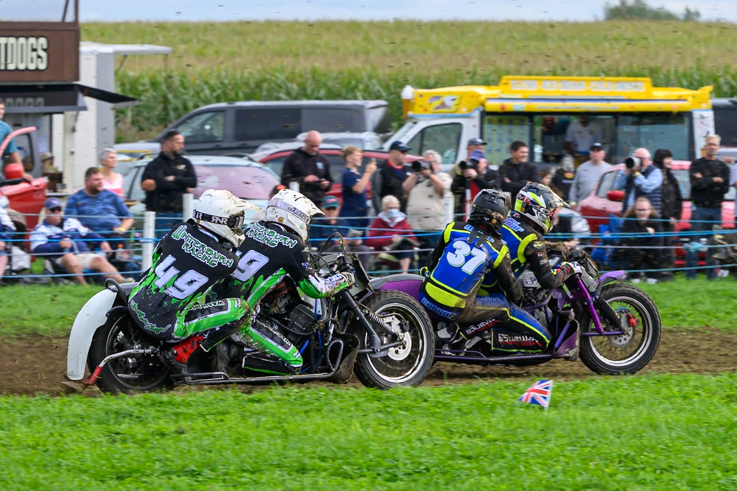 British Masters 1000cc Sidecars: Gareth Winterburn/Frankie Courtney (49) chases Mark Cossar/Wayne Rickards (37)  during the British Masters Grasstrack Championship at Lower Marsh Farm, Much Hoole, Preston in Lancashire, England on Sunday 13th September 2026. (Photo: Ian Charles | MI News)