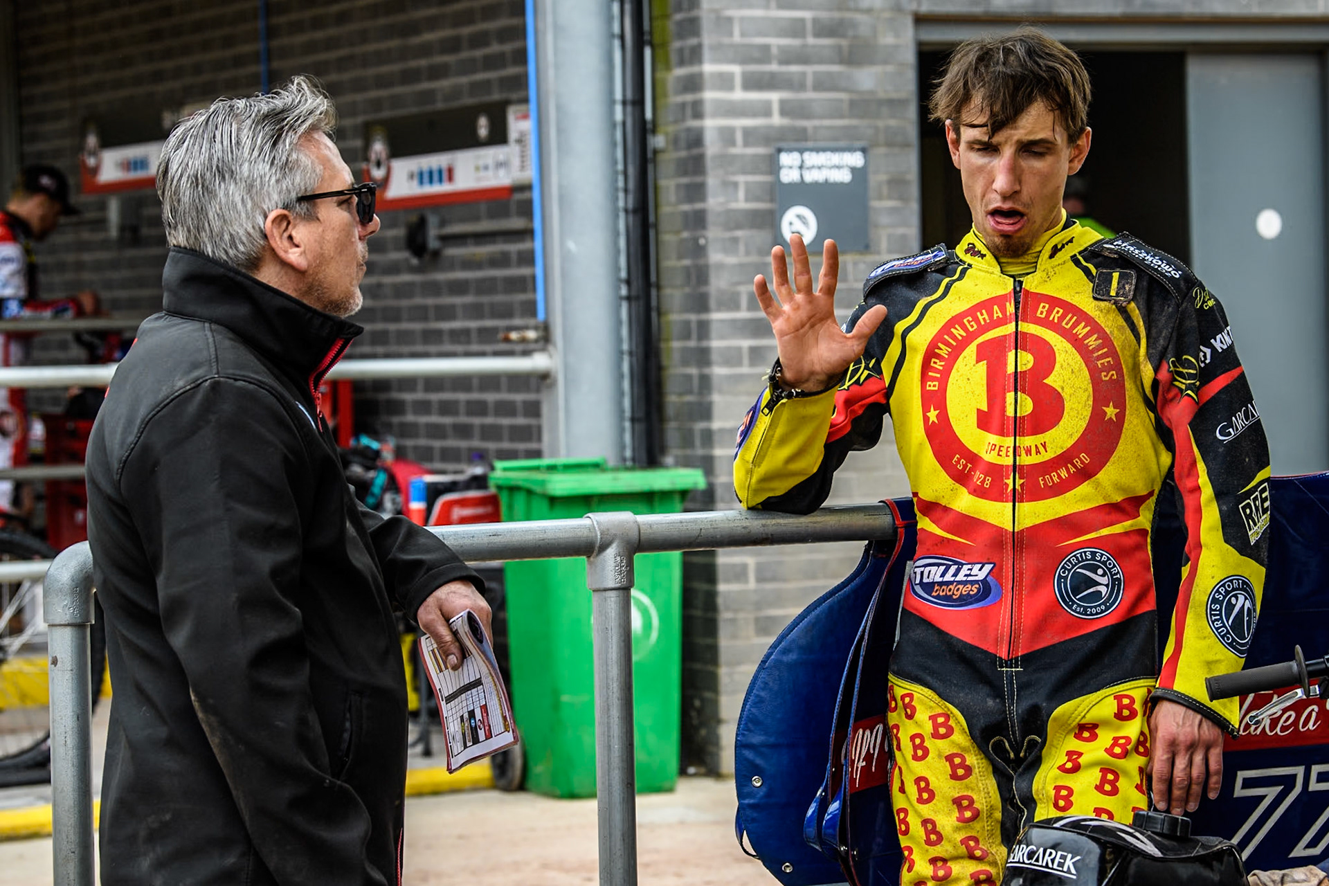 Birmingham Brummies' Piotr Pawlicki  (Right) tells Birmingham Brummies' Team Manager Sam Ermolenko  what happened in his last heat during the Rowe Motor Oil Premiership match between Belle Vue Aces and Birmingham Brummies at the National Speedway Stadium, Manchester on Monday 6th May 2024. (Photo: Ian Charles | MI News)