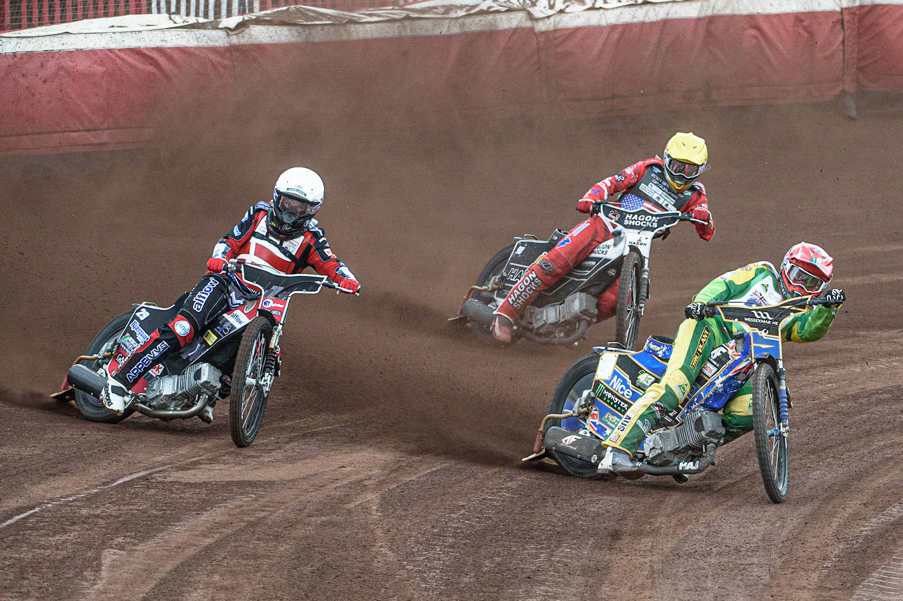 GLASGOW, UK. JUNE 19TH.  Chris Holder (Australia) (Red) leads Nicolai Klindt (Denmark) (White) and Broc Nicol (USA) (Yellow) during the FIM Speedway Grand Prix Qualifying Round at the Peugeot Ashfield Stadium, Glasgow on Saturday 19th June 2021. (Credit: Ian Charles | MI News)