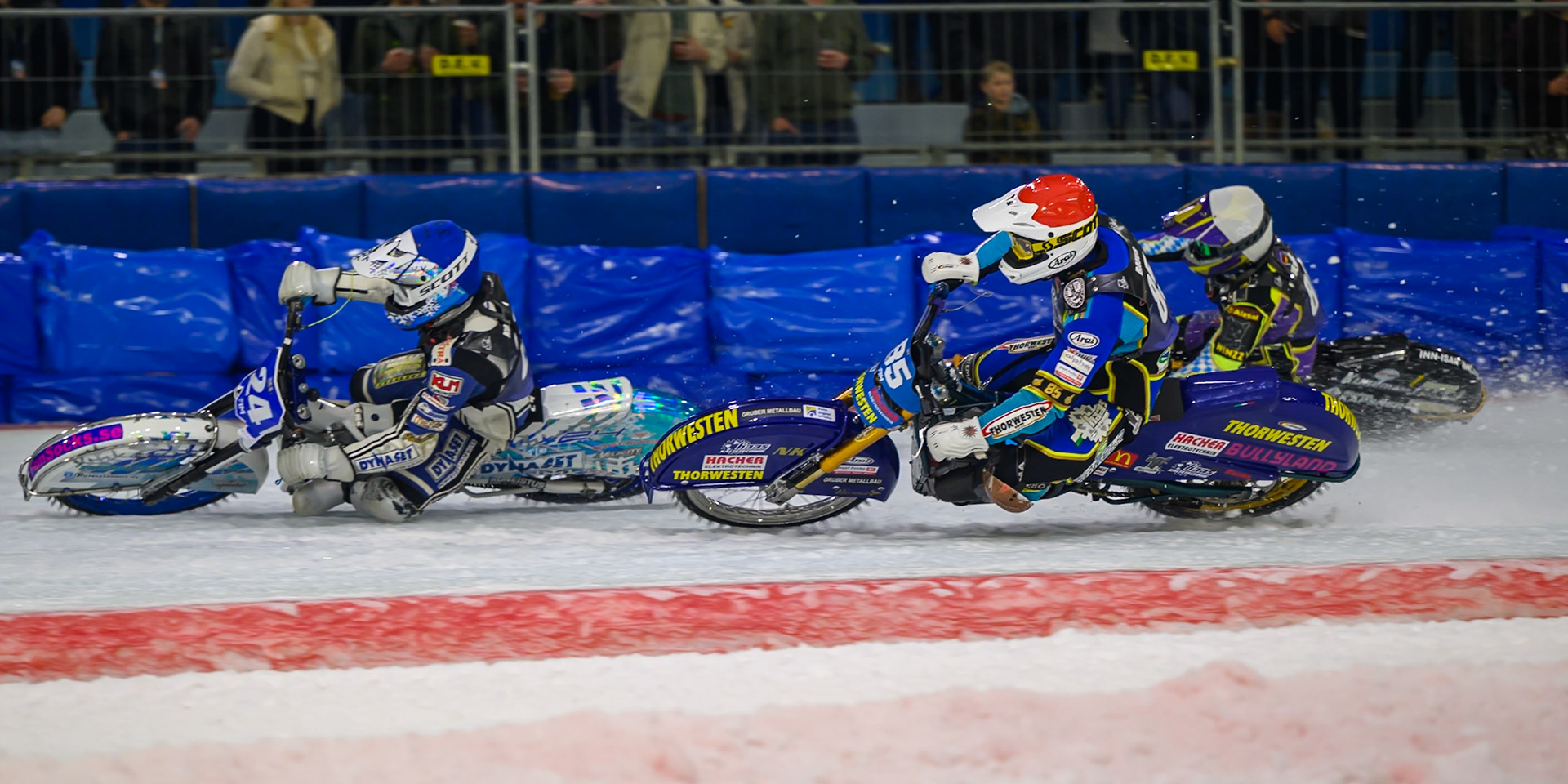 Max Koivula (24) of Finland  in Blue leading Luca Bauer (85) of Italy/Germany  in Red and Max Niedermaier (88) of Germany  in White during the FIM Ice Speedway Gladiators World Championship Final 3 at Ice Rink Thialf, Heerenveen on Saturday 11th April 2026. (Photo: Ian Charles | MI News)