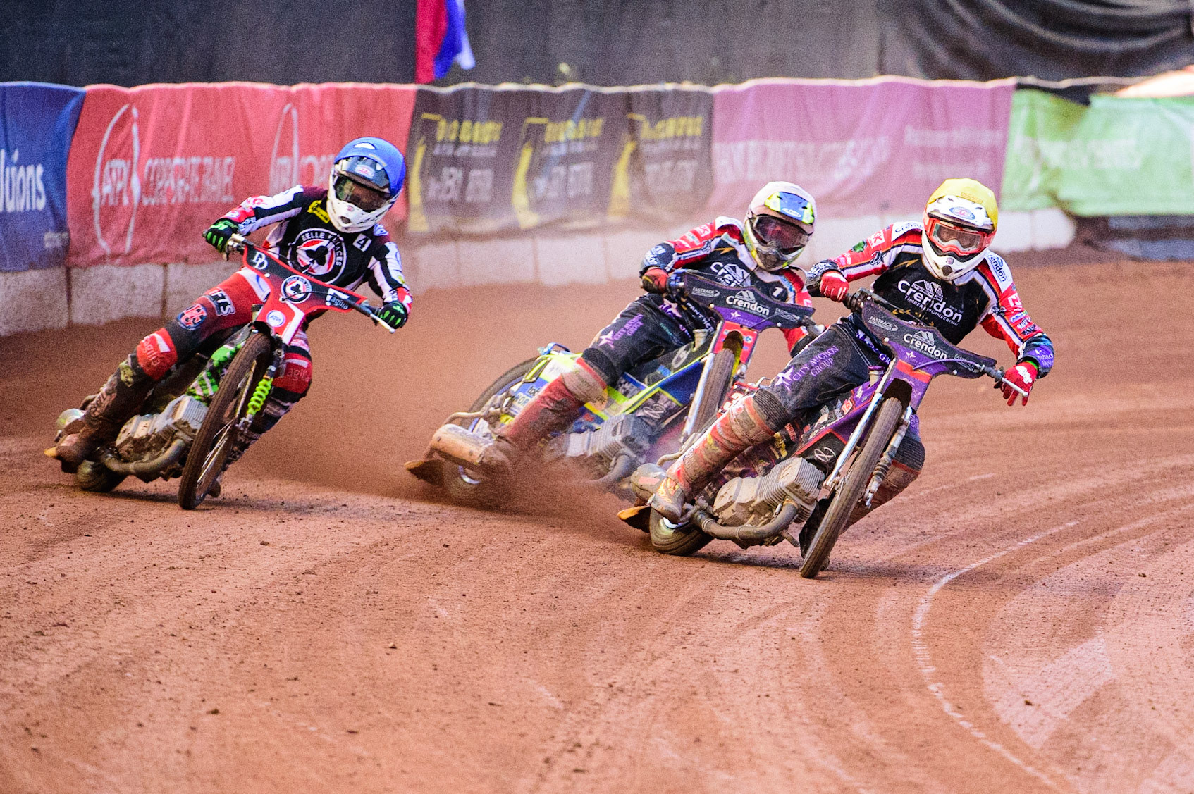 Ulrich Oostergaard   (Yellow) leads Charles Wright (Blue) and Chris Harris  (White) during the SGB Premiership match between Belle Vue Aces and Peterborough at the National Speedway Stadium, Manchester on Monday 25th July 2022. (Credit: Ian Charles | MI News