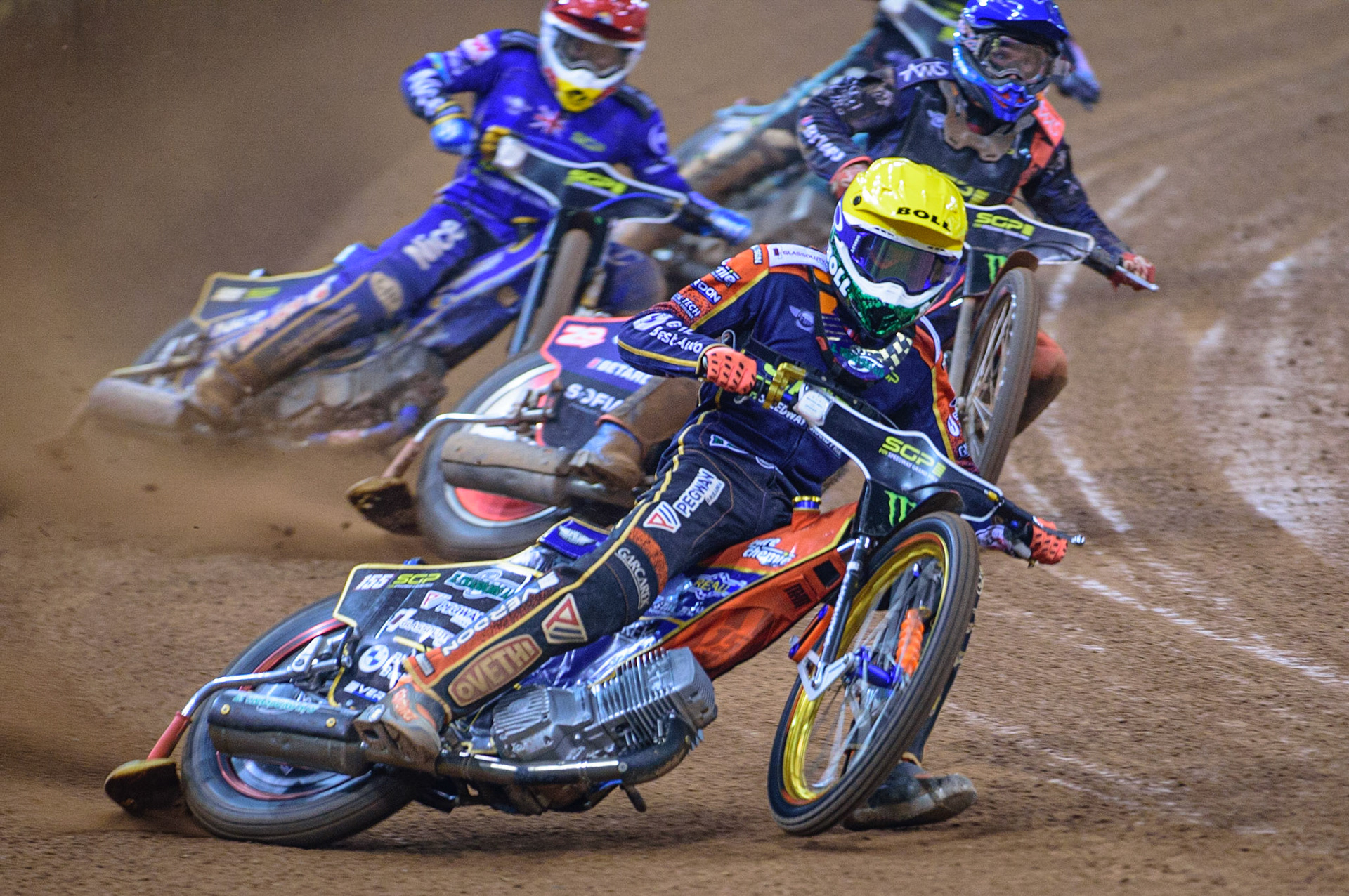 Mikkel Michelsen (155) (Yellow) leads Andžejs Ļebedevs (29) (Blue) and Robert Lambert (505) (Red) during the FIM  Speedway Grand Prix of Great Britain at the Principality Stadium, Cardiff on Saturday 13th August 2022. (Credit: Ian Charles | MI News