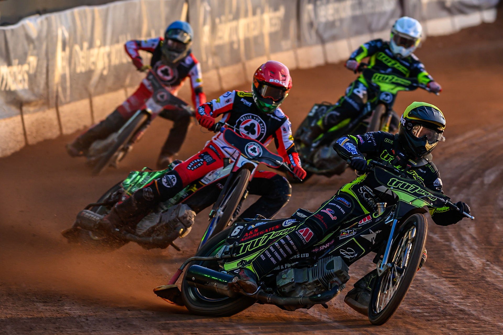 Dan Thompson of Ipswich Witches  in Yellow leading Brady Kurtz of Belle Vue Aces  in Red, Emil Sayfutdinov of Ipswich Witches  in White, and Norick Blödorn of Belle Vue Aces  in Blue during the Rowe Motor Oil Premiership match between Belle Vue Aces and Ipswich Witches at the National Speedway Stadium, Manchester on Monday 4th August 2025. (Photo: Ian Charles | MI News)