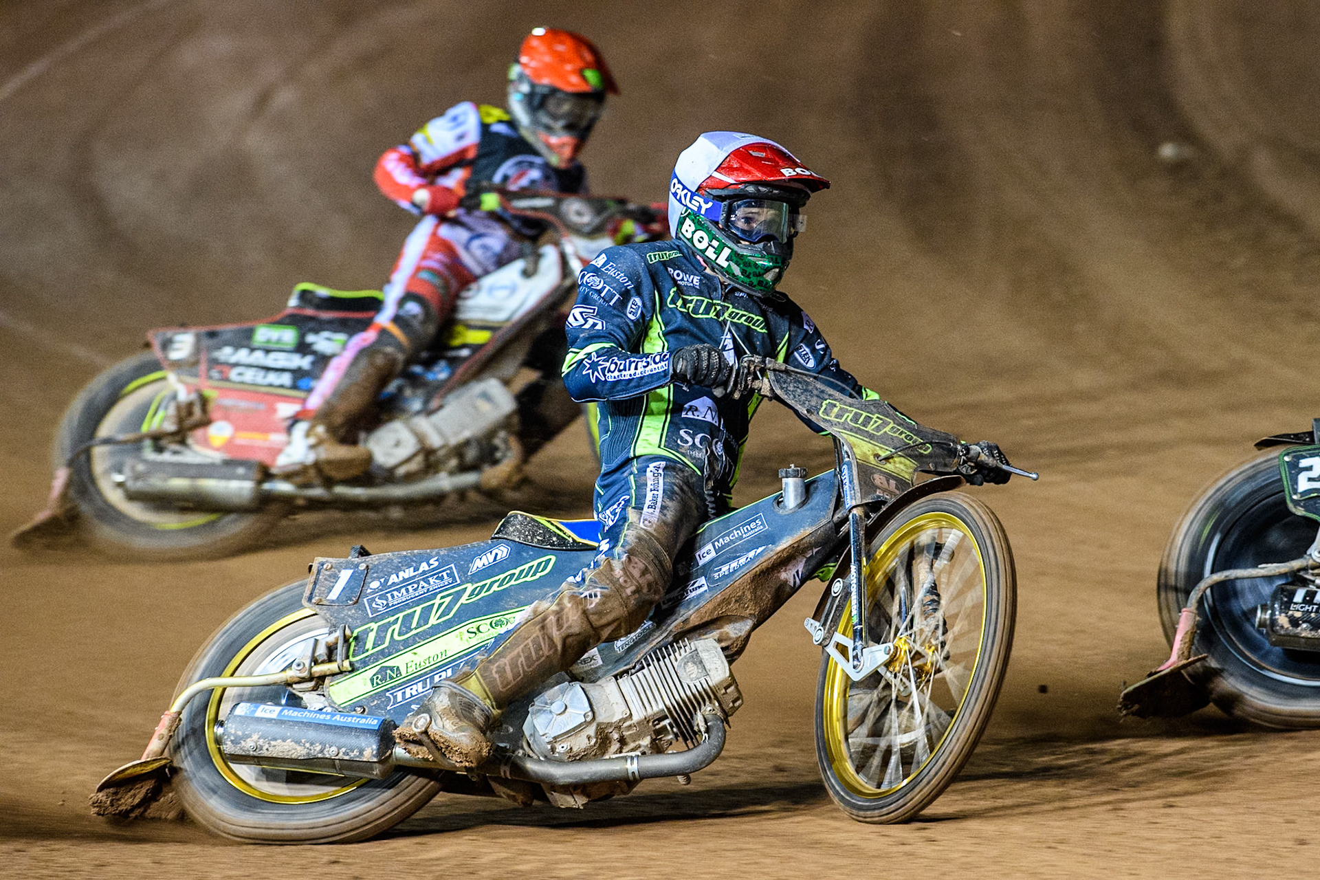 Jason Doyle of Ipswich Witches in White leading Jaimon Lidsey of Belle Vue Aces in Red during the Premiership Cup Quarter Final 1st Leg match between Belle Vue Aces and Ipswich Witches at the National Speedway Stadium, Manchester on Monday 24th March 2025. (Photo: Ian Charles | MI News)