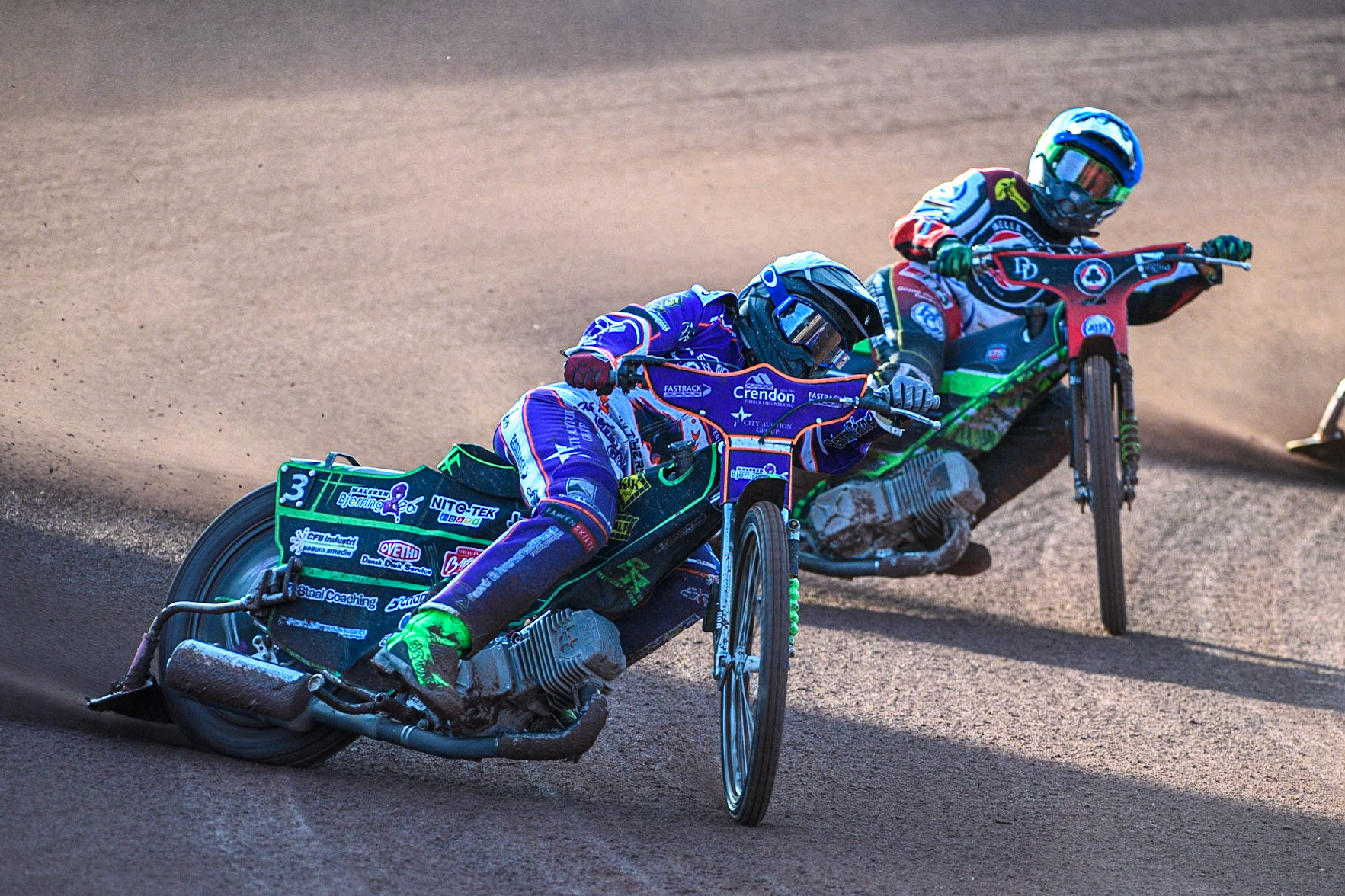 Benjamin Basso (White) leads Charles Wright (Blue) during the Sports Insure Premiership match between Belle Vue Aces and Peterborough at the National Speedway Stadium, Manchester on Monday 19th June 2023. (Photo: Ian Charles | MI News)
