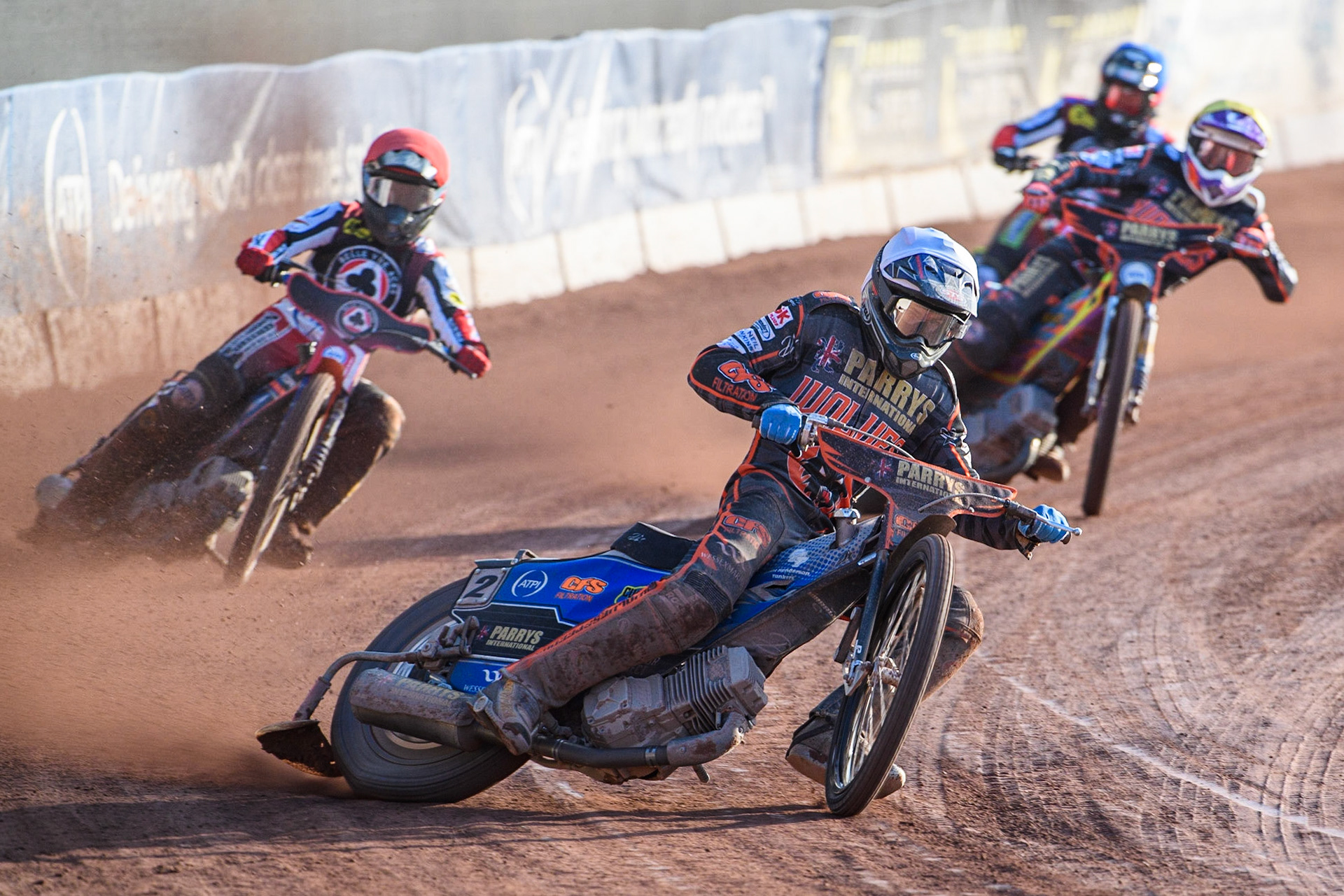 Steve Worrall (White) leads Brady Kurtz (Red) Charles Wright (Yellow) and Tom Brennan (Blue) during the Sports Insure Premiership match between Belle Vue Aces and Wolverhampton Wolves at the National Speedway Stadium, Manchester on Monday 3rd July 2023. (Photo: Ian Charles | MI News)