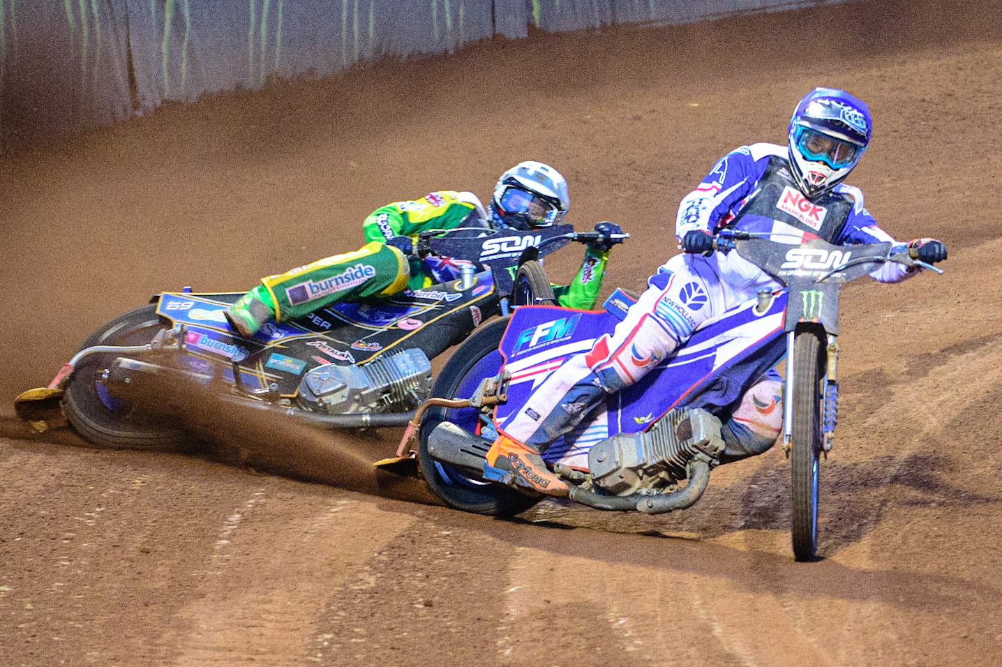 MANCHESTER, UK. OCT 16TH Jason Doyle of Australia (White) locks up behind Dmitri Berge of France (Blue) during the Monster Energy FIM Speedway of Nations at the National Speedway Stadium, Manchester on Saturday  16th October 2021. (Credit: Ian Charles | MI News)