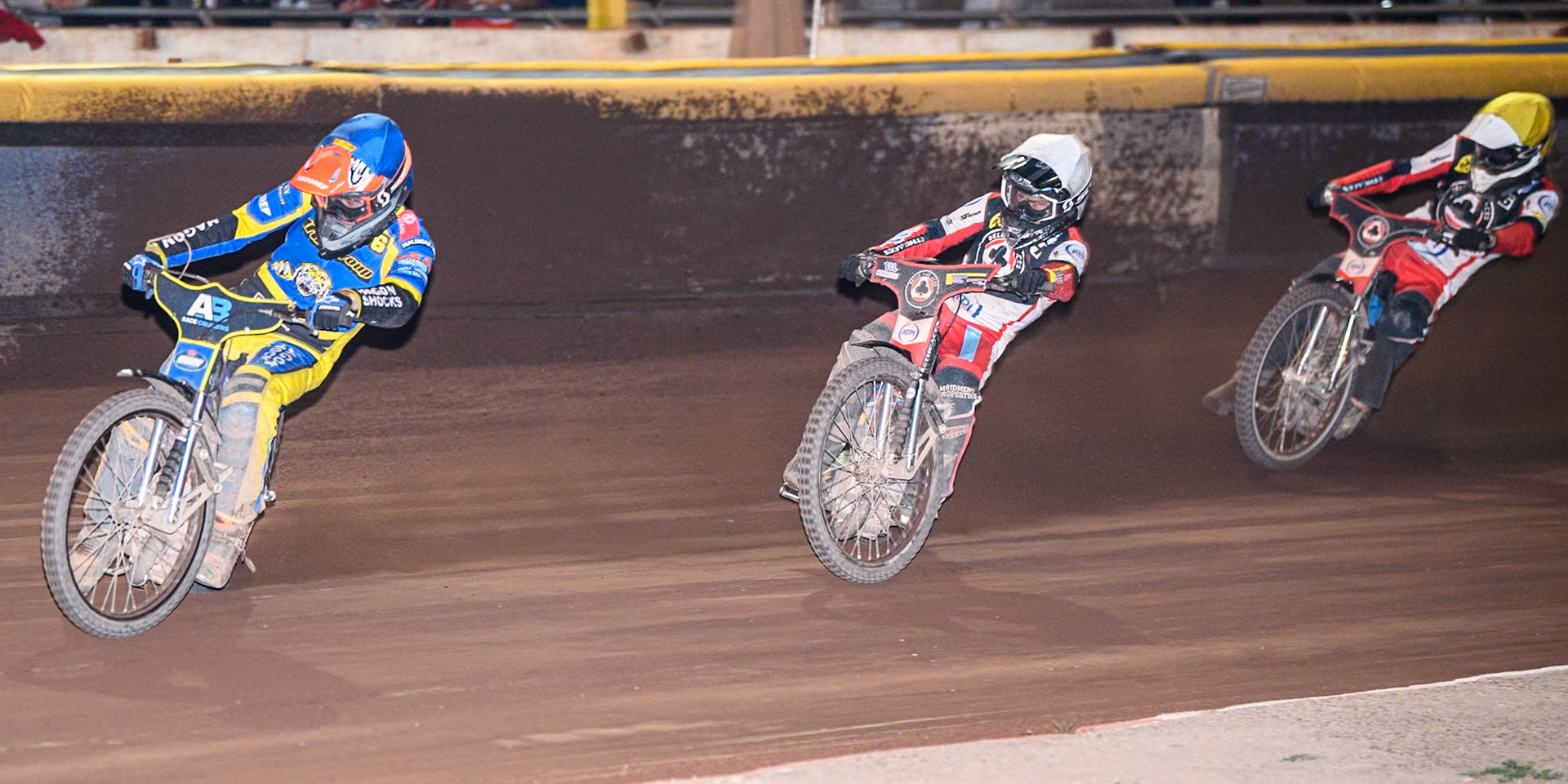 Sheffield Tigers' Jason Edwards  in Blue leading Belle Vue Aces' Ben Cook  in White and Belle Vue Aces' Antti Vuolas  in Yellow during the Rowe Motor Oil Premiership match between Sheffield Tigers and Belle Vue Aces at Owlerton Stadium, Sheffield on Monday 26th August 2024. (Photo: Ian Charles | MI News)