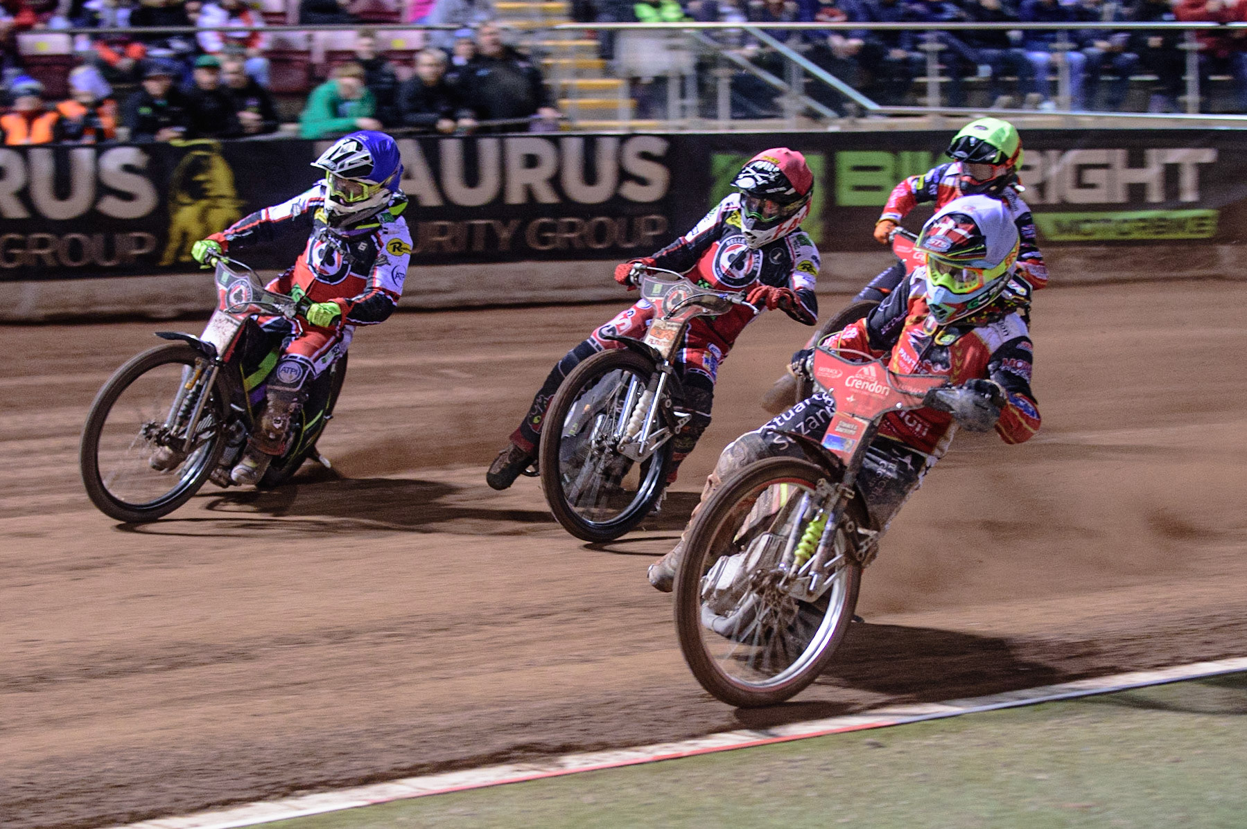 MANCHESTER, UK. OCT 11TH  Michael Palm Toft  (White) takes the inside line ahead of Dan Bewley  (Red), Tom Brennan  (Blue) with Jordan Palin  (Yellow) behind during the SGB Premiership Grand Final 1st Leg between Belle Vue Aces and Peterborough Panthers at the National Speedway Stadium, Manchester on Monday 11th October 2021. (Credit: Ian Charles | MI News)