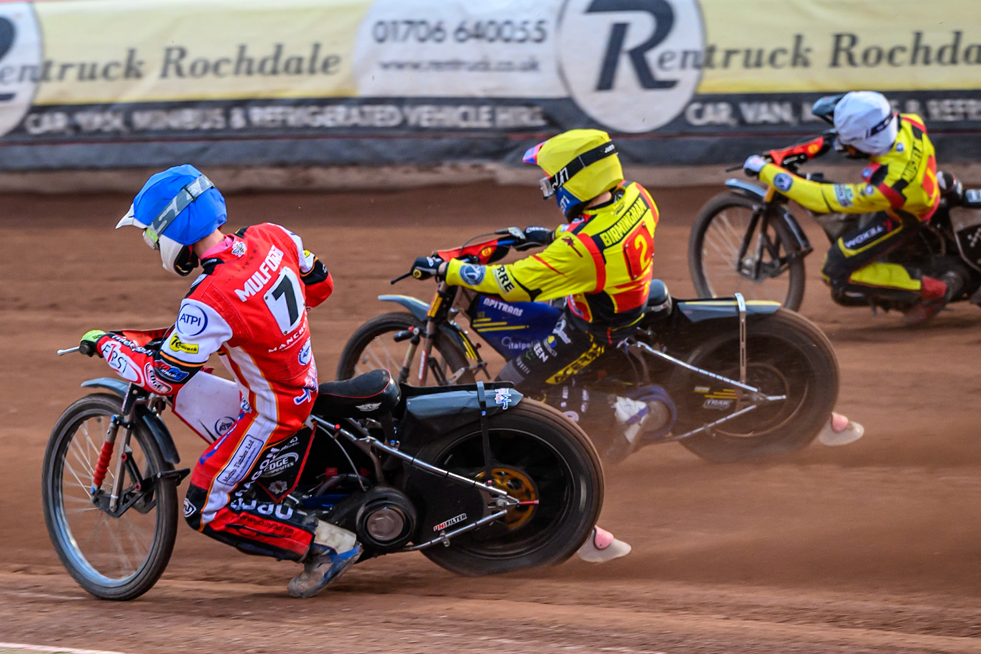 Belle Vue Aces' Jake Mulford  in Blue rides inside Birmingham Brummies' Paco Castagna  in Yellow and Birmingham Brummies' Tobias Musielak  in White during the Rowe Motor Oil Premiership match between Belle Vue Aces and Birmingham Brummies at the National Speedway Stadium, Manchester on Monday 7th July 2025. (Photo: Ian Charles | MI News)