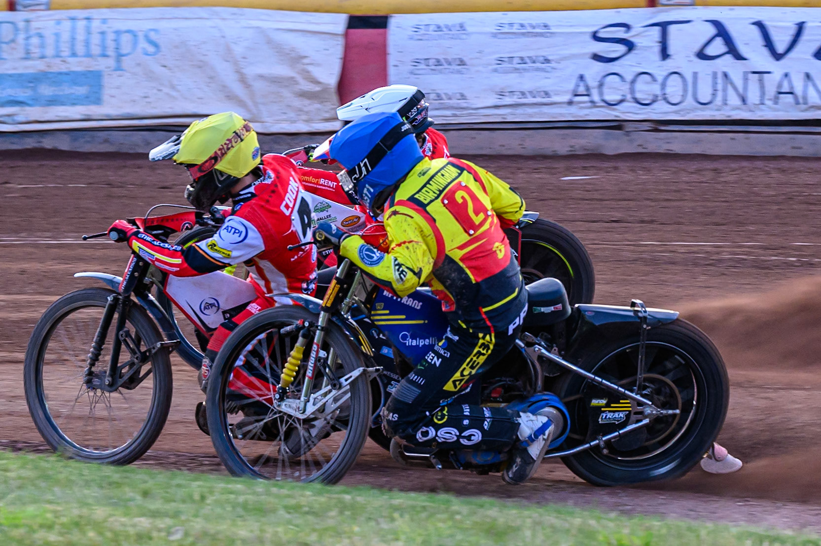 Birmingham Brummies' Paco Castagna in Blue tries to pass Belle Vue Aces' Zach Cook in Yellow and Belle Vue Aces' Jaimon Lidsey in White during the Rowe Motor Oil Premiership match between Birmingham Brummies and Belle Vue Aces at Perry Bar Stadium, Birmingham on Monday 2nd June 2025. (Photo: Ian Charles | MI News)