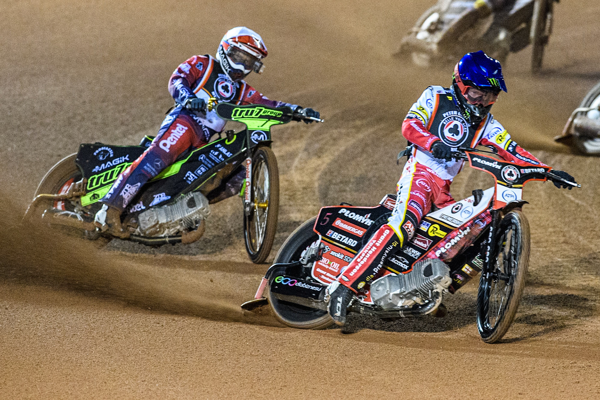 Dan Bewley in Blue leading Emil Sayfutdinov in White during the Peter Craven Memorial Trophy at the National Speedway Stadium, Manchester on Monday 17th March 2025. (Photo: Ian Charles | MI News)