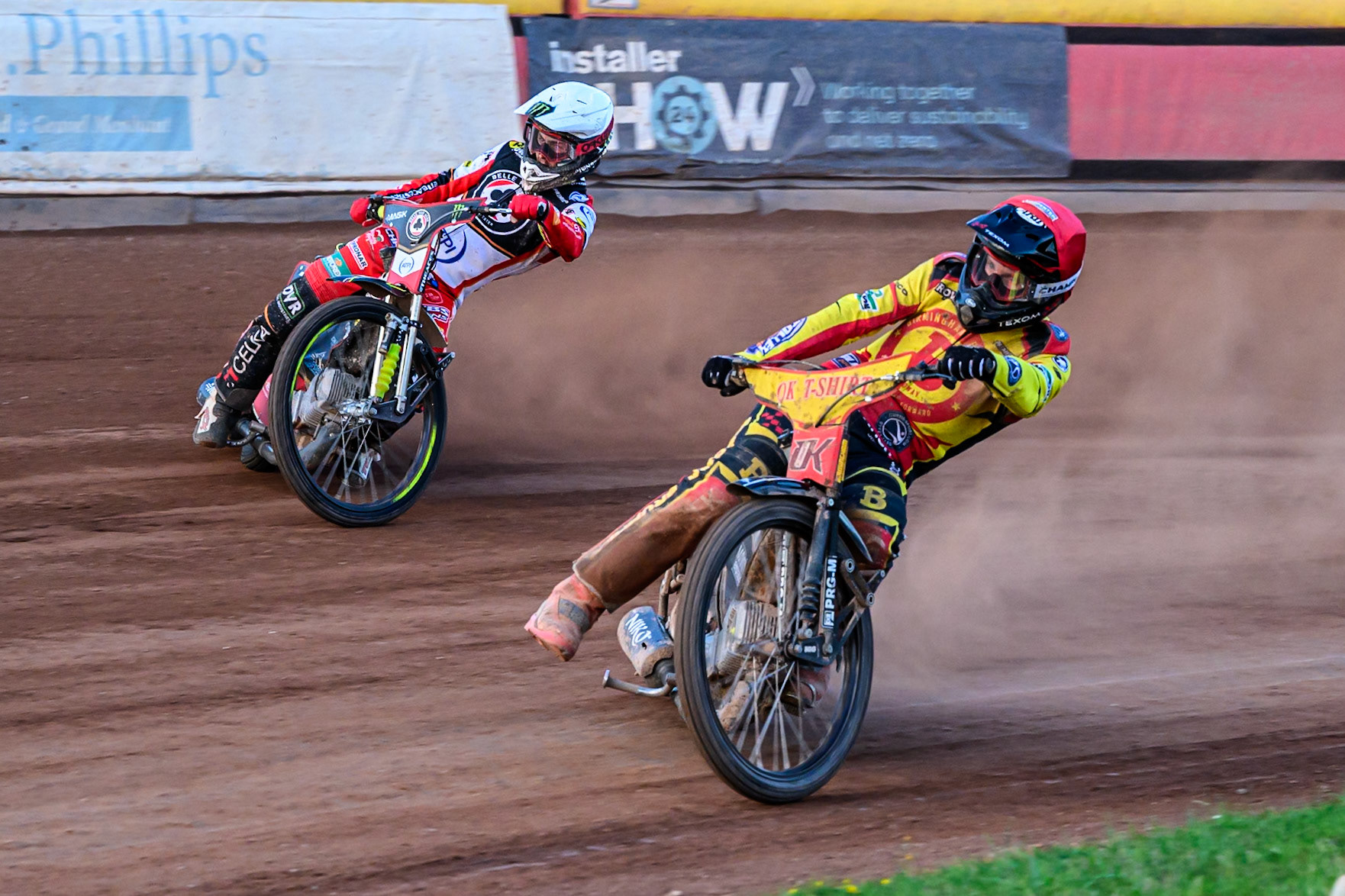 Birmingham Brummies' Tobias Musielak  in Red leading Belle Vue Aces' Jaimon Lidsey  in White during the Rowe Motor Oil Premiership match between Birmingham Brummies and Belle Vue Aces at Perry Barr Stadium, Birmingham on Monday 28th July 2025. (Photo: Ian Charles | MI News)