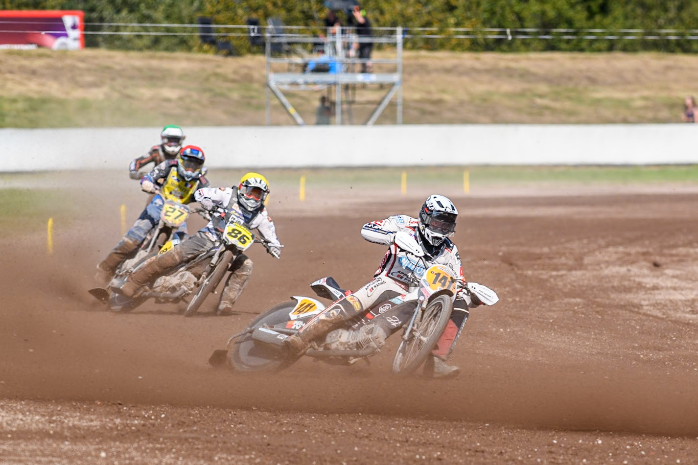 Andrew Appleton (141) of Great Britain in White leading Hynek Stichauer (86) of Czech Republic  in YellowMathias Trésarrieu (27) of France in Red and Nigel Hummel of The Netherlands in Green  during the FIM Long Track World Championship Final 5 at the Speed Centre Roden, Roden, Netherlands on Sunday 22nd September 2024. (Photo: Ian Charles | MI News)