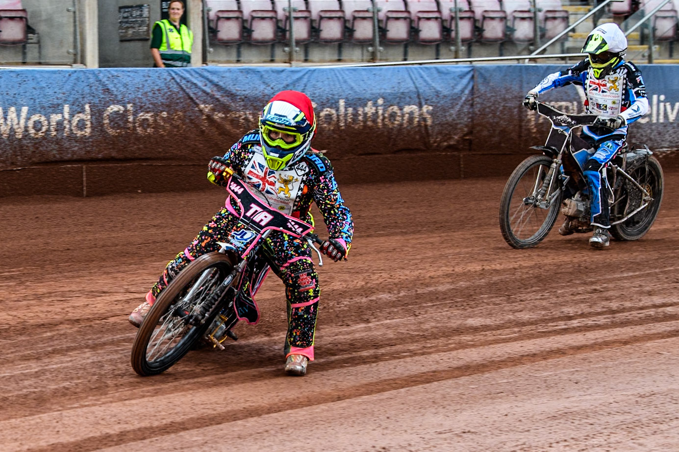 Tia May Brant (125cc) in Red leading Jack Scully-Syer (125cc)  in White during the British Youth 500cc Championships at the National Speedway Stadium, Manchester on Friday 2nd August 2024. (Photo: Ian Charles | MI News)