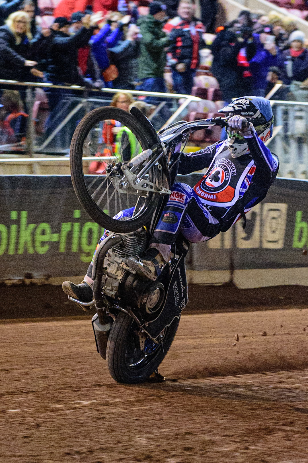 MANCHESTER, UK. OCT 23RD  Dan Bewley  celebrates with a wheelie during the Peter Craven Memorial Trophy event at the National Speedway Stadium, Manchester on Saturday 23rd October 2021. (Credit: Ian Charles | MI News)
