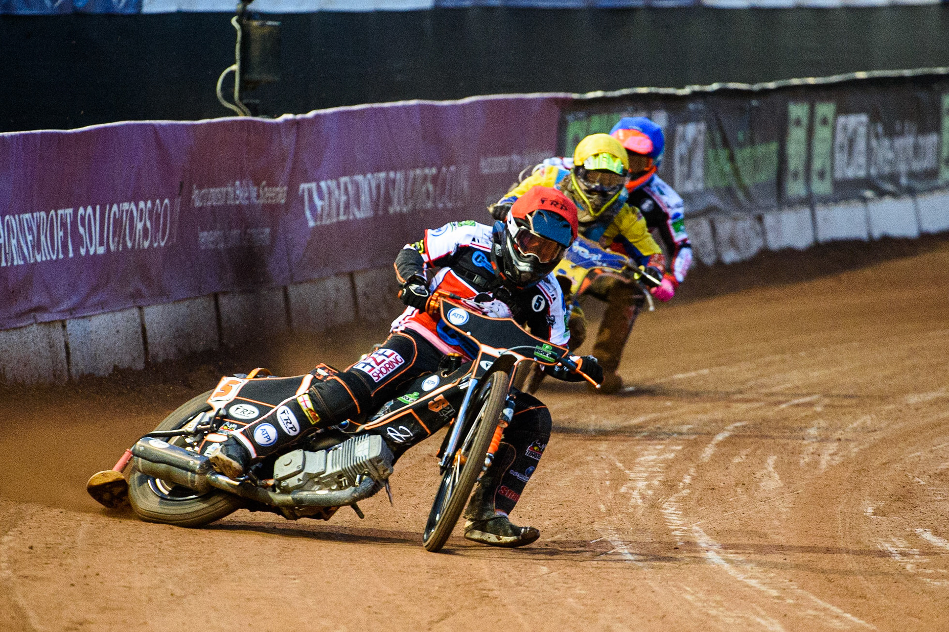 MANCHESTER, UK. AUGUST 20TH Jack Smith  (Red) leads George Rothery  (Yellow)  and Connor Coles  (Blue) during the National Development League match between Belle Vue Aces and Armadale Devils at the National Speedway Stadium, Manchester on Friday 20th August 2021. (Credit: Ian Charles | MI News)