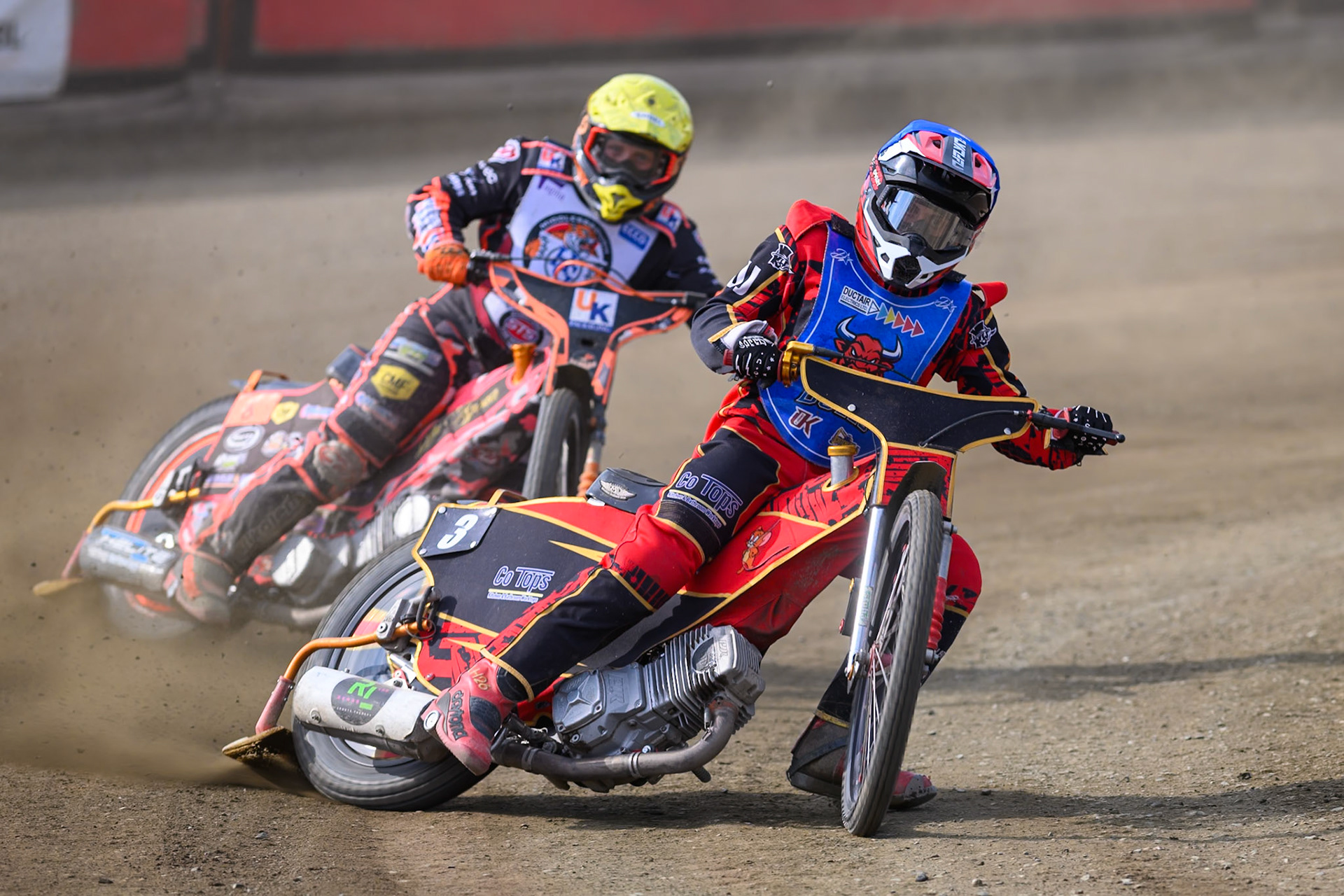 Luke Harris of Buxton Bulls in Blue leading Alex Spooner of Middlesborough Tigers in Yellow during the WSRA National Development League match  between Buxton Bulls and Middlesborough Tigers at Hi-Edge Speedway, Buxton on Sunday 16th August 2026. (Photo: Ian Charles | MI News)