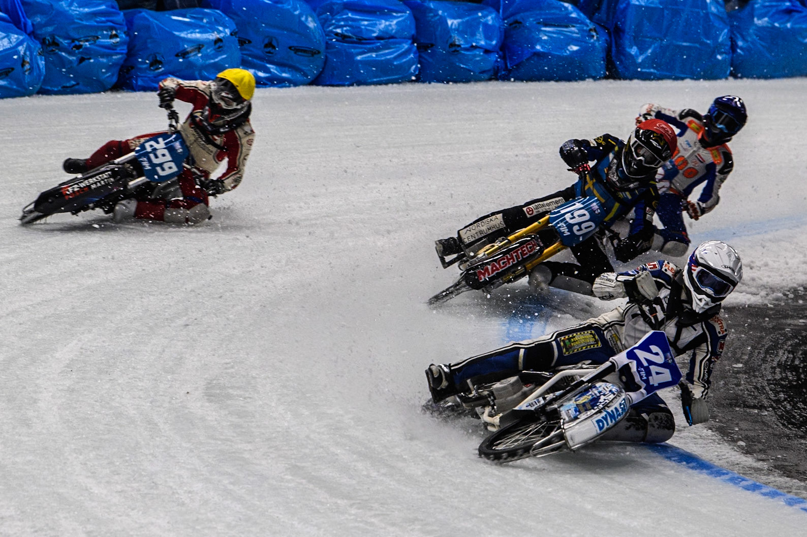 Max Koivula (24) of Finland in White leading Martin Haarahiltunen (199) of Sweden in Red Martin Posch (299) of Austria in Yellow and Jasper Iwema (800) of The Netherlands in Blue during the Ice Speedway Gladiators World Championship Final 1 at Max-Aicher-Arena, Inzell on Saturday 15th March 2025. (Photo: Ian Charles | MI News)