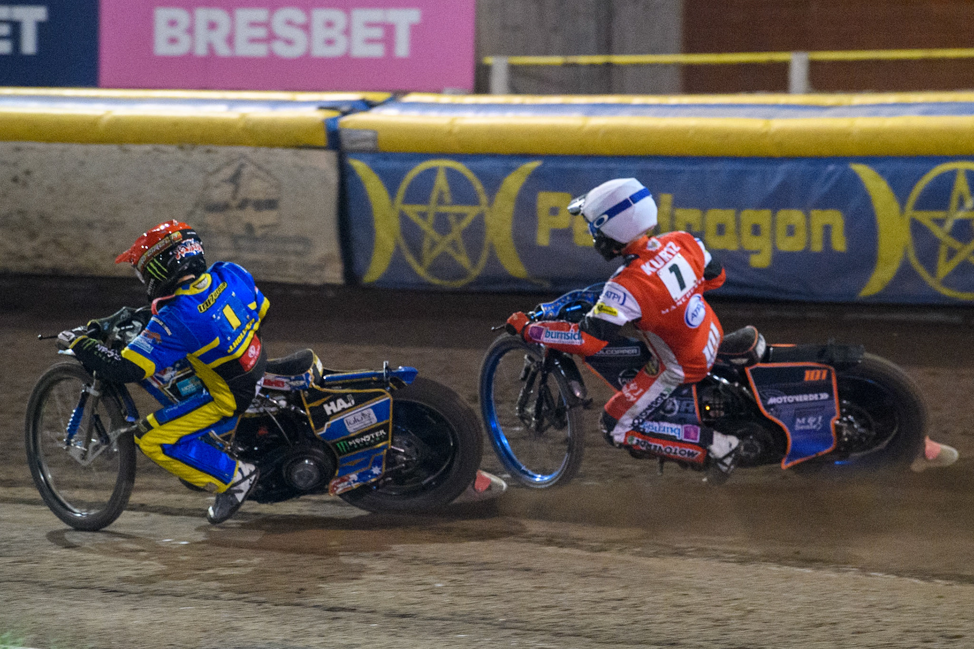 Sheffield Tigers' Jack Holder  in Red rides inside Belle Vue Aces' Brady Kurtz  in White during the Rowe Motor Oil Premiership Play Off Semi Final 2nd leg between Sheffield Tigers and Belle Vue Aces at Owlerton Stadium, Sheffield on Thursday 19th September 2024. (Photo: Ian Charles | MI News)