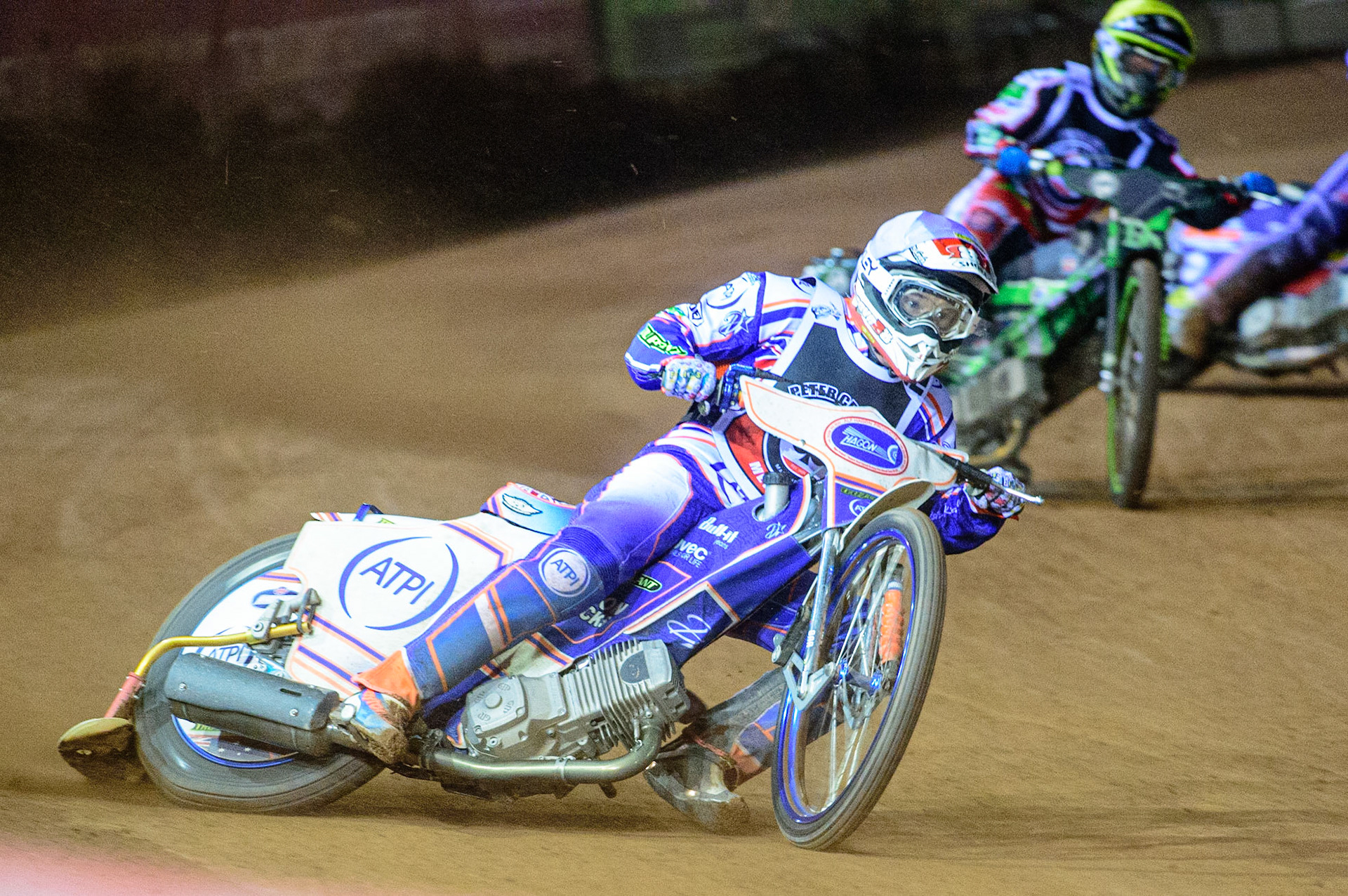 MANCHESTER, UK. OCT 23RD  Jason Crump  (White) leads Charles Wright  (Yellow) during the Peter Craven Memorial Trophy event at the National Speedway Stadium, Manchester on Saturday 23rd October 2021. (Credit: Ian Charles | MI News)