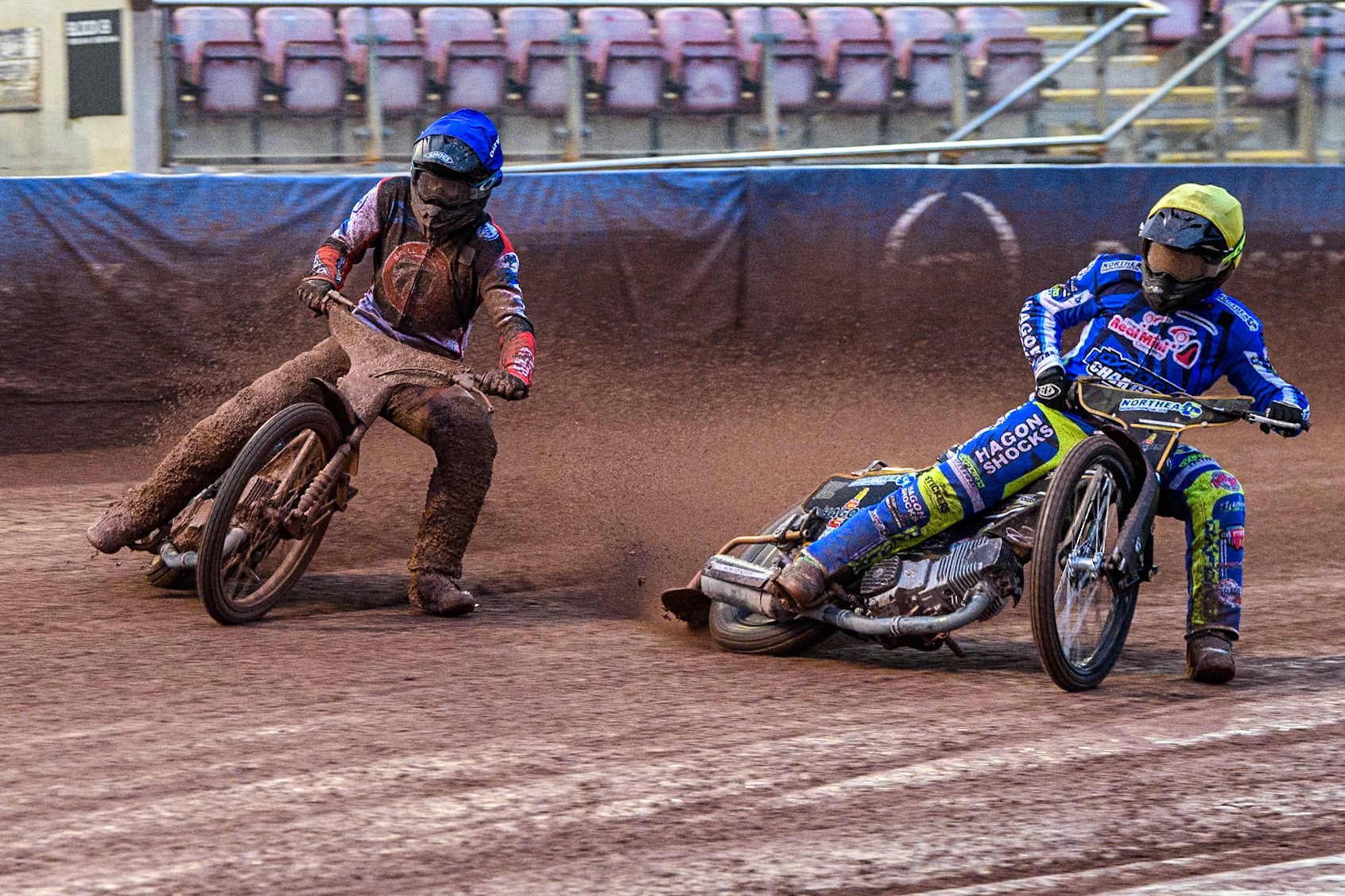 Oxford Chargers' Ashton Vale  in Yellow rides inside Belle Vue Colts' Matt Marson  in Blue during the WSRA National Development League match between Belle Vue Colts and Oxford Chargers at the National Speedway Stadium, Manchester on Friday 2nd August 2024. (Photo: Ian Charles | MI News)