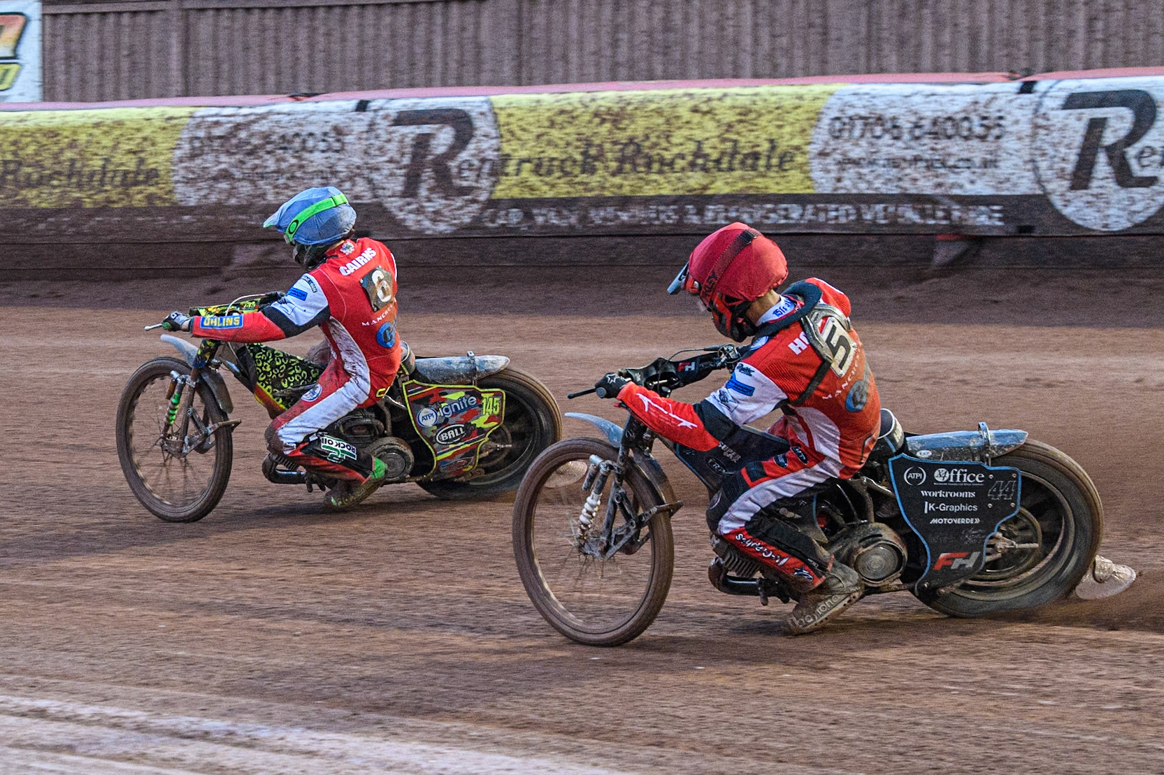 Belle Vue Colts' Freddy Hodder  in Red chases team mate Belle Vue Colts' William Cairns  in Blue during the WSRA National Development League match between Belle Vue Colts and Oxford Chargers at the National Speedway Stadium, Manchester on Friday 2nd August 2024. (Photo: Ian Charles | MI News)