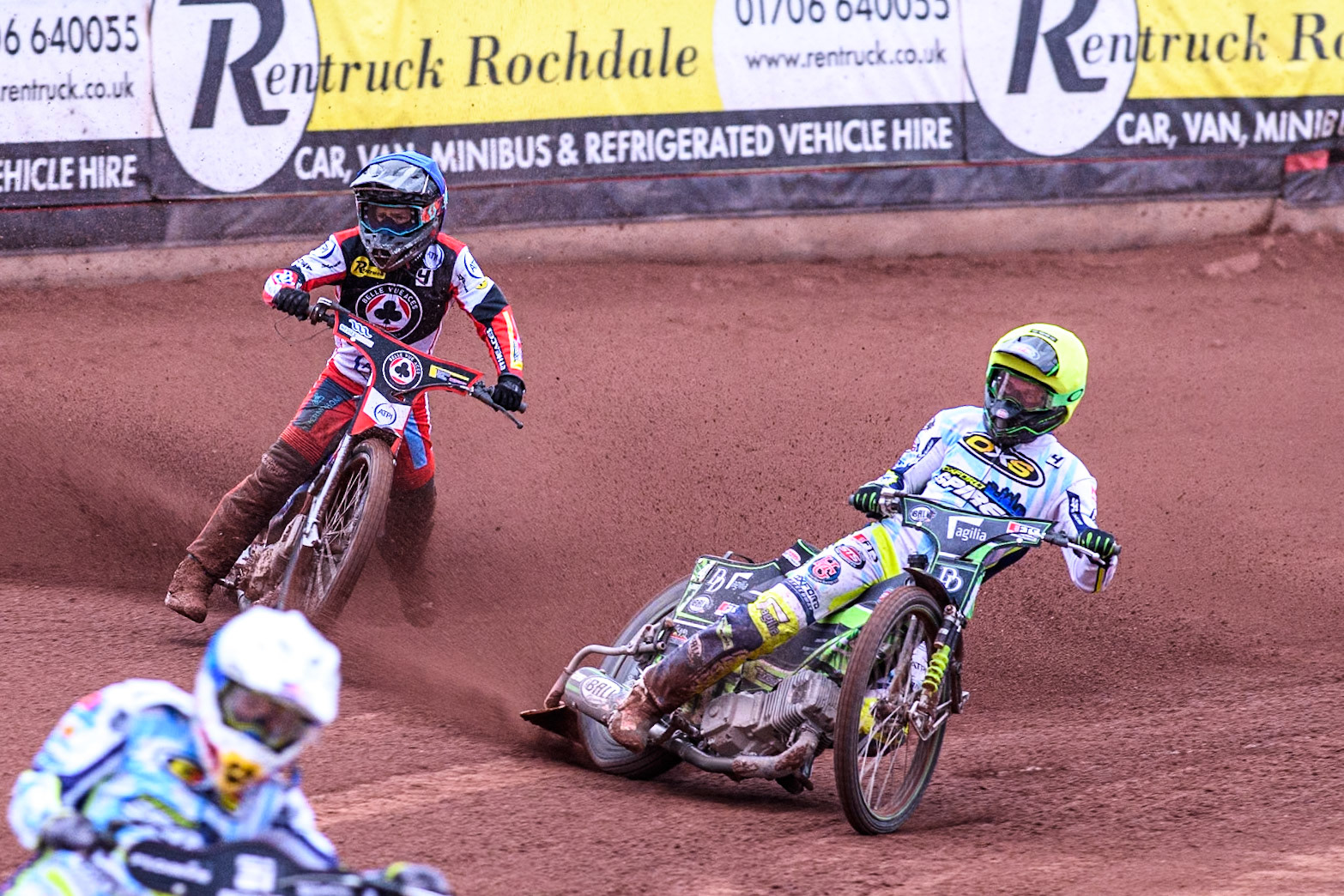 Belle Vue Aces' Ben Cook in Blue loses control after a tangle with Oxford Spires' Charles Wright in Yellow during the Rowe Motor Oil Premiership match between Belle Vue Aces and Oxford Spires at the National Speedway Stadium, Manchester on Monday 22nd July 2024. (Photo: Ian Charles | MI News)