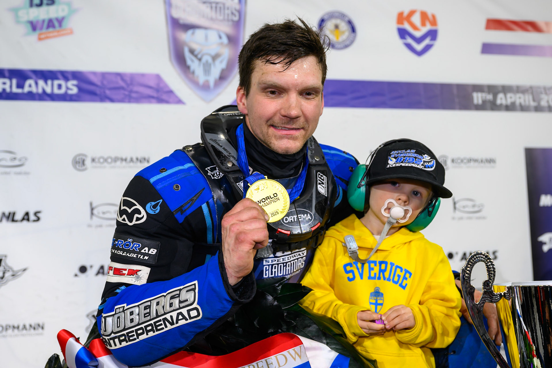 Niclas Svensson (192) of Sweden  - The New World Champion with his son during the FIM Ice Speedway Gladiators World Championship Final 3 at Ice Rink Thialf, Heerenveen on Saturday 11th April 2026. (Photo: Ian Charles | MI News)