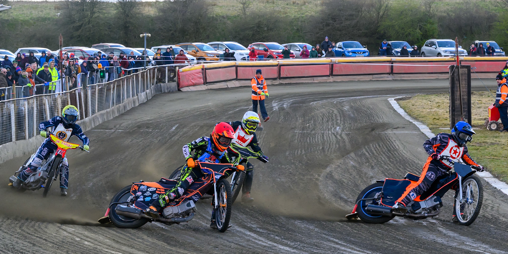 Jack Roberts of 'The Potters'  in Blue leading Jack Smith of Buxton Bulls in Red, Alex Spooner of 'The Kings'  in White and Ryan Ashcroft of 'The Wolves'  in Yellow during the Regina Chains Fours at Buxton Speedway, Buxton on Sunday 5th April 2026. (Photo: Ian Charles | MI News)
