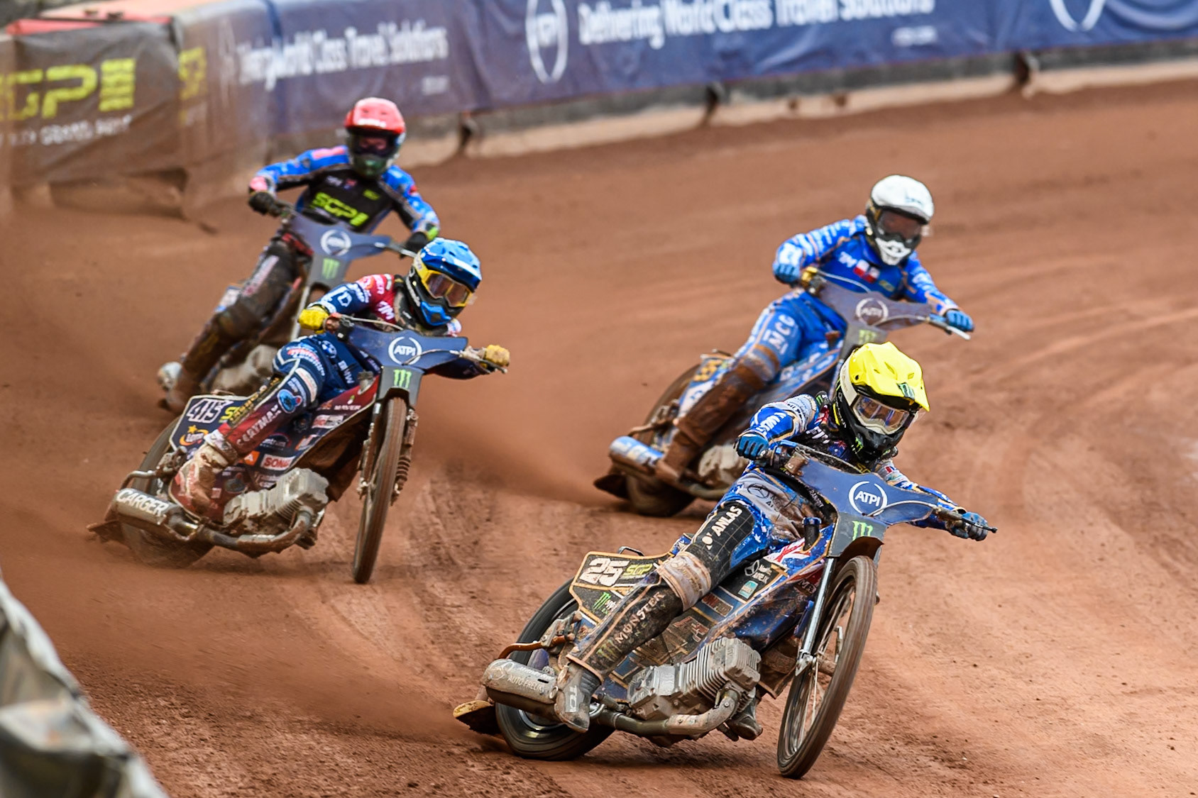 Jack Holder (25) of Australia in Yellow leading Dominik Kubera (415) of Poland in Blue, Bartosz Zmarzlik (95) of Poland in White and Jason Doyle (69) of Australia in Red during the ATPI FIM Speedway Grand Prix Round 4 at the National Speedway Stadium, Manchester, on Friday 13th June 2025. (Photo: Ian Charles | MI News)