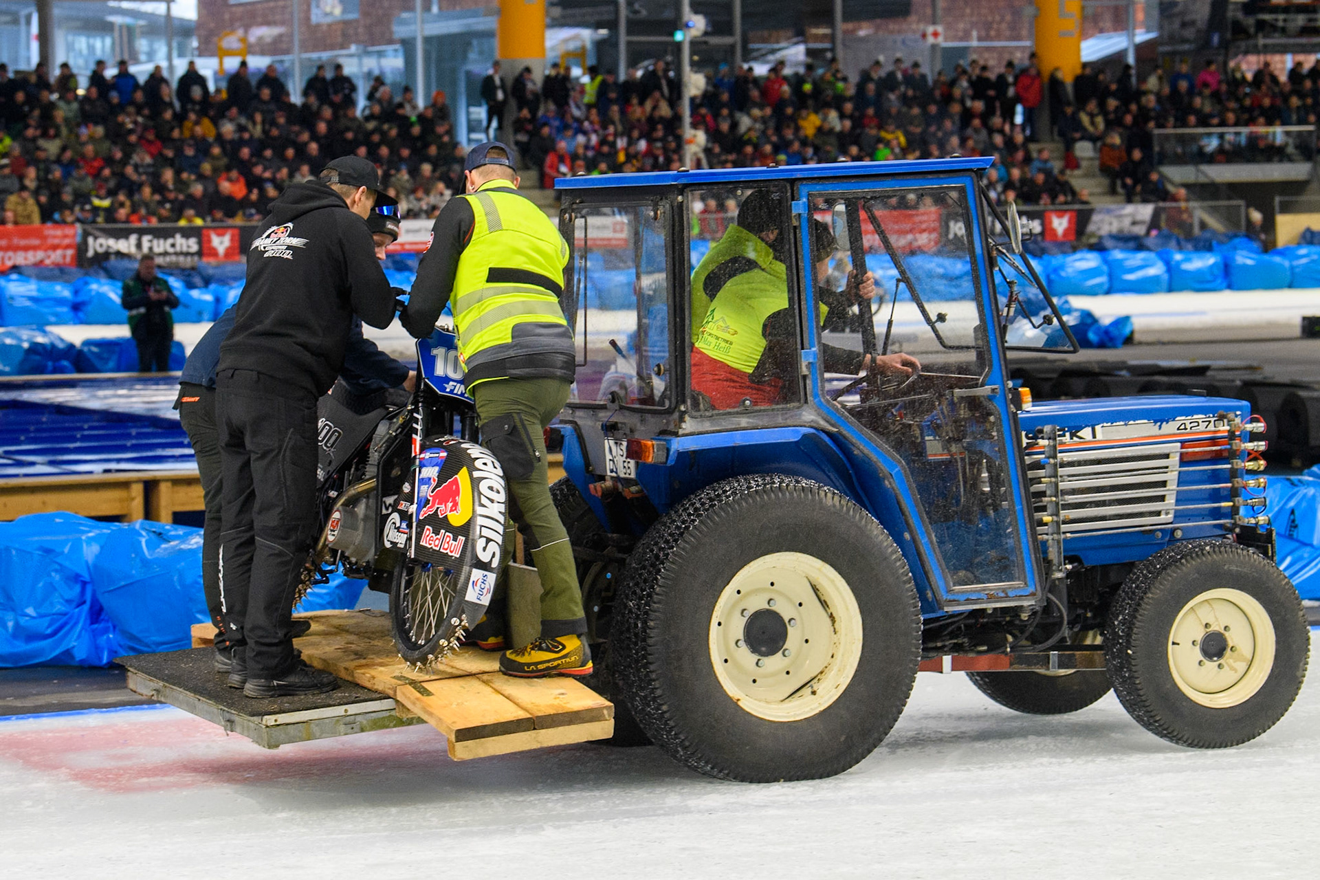 Franky Zorn’s team take is bike back to the paddock during the Ice Speedway Gladiators World Championship Final 2 at Max-Aicher-Arena, Inzell on Sunday 16th March 2025. (Photo: Ian Charles | MI News)