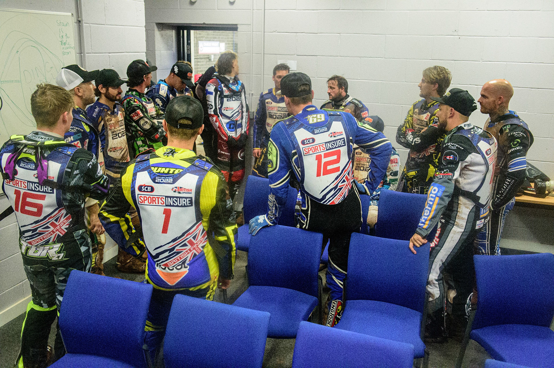 The riders hold a meeting after heat 12 during the Sports Insure British Speedway Championship Final at the National Speedway Stadium, Bellevue, Manchester, England on Monday 1st August 2022. (Photo by: Ian Charles | MI News)