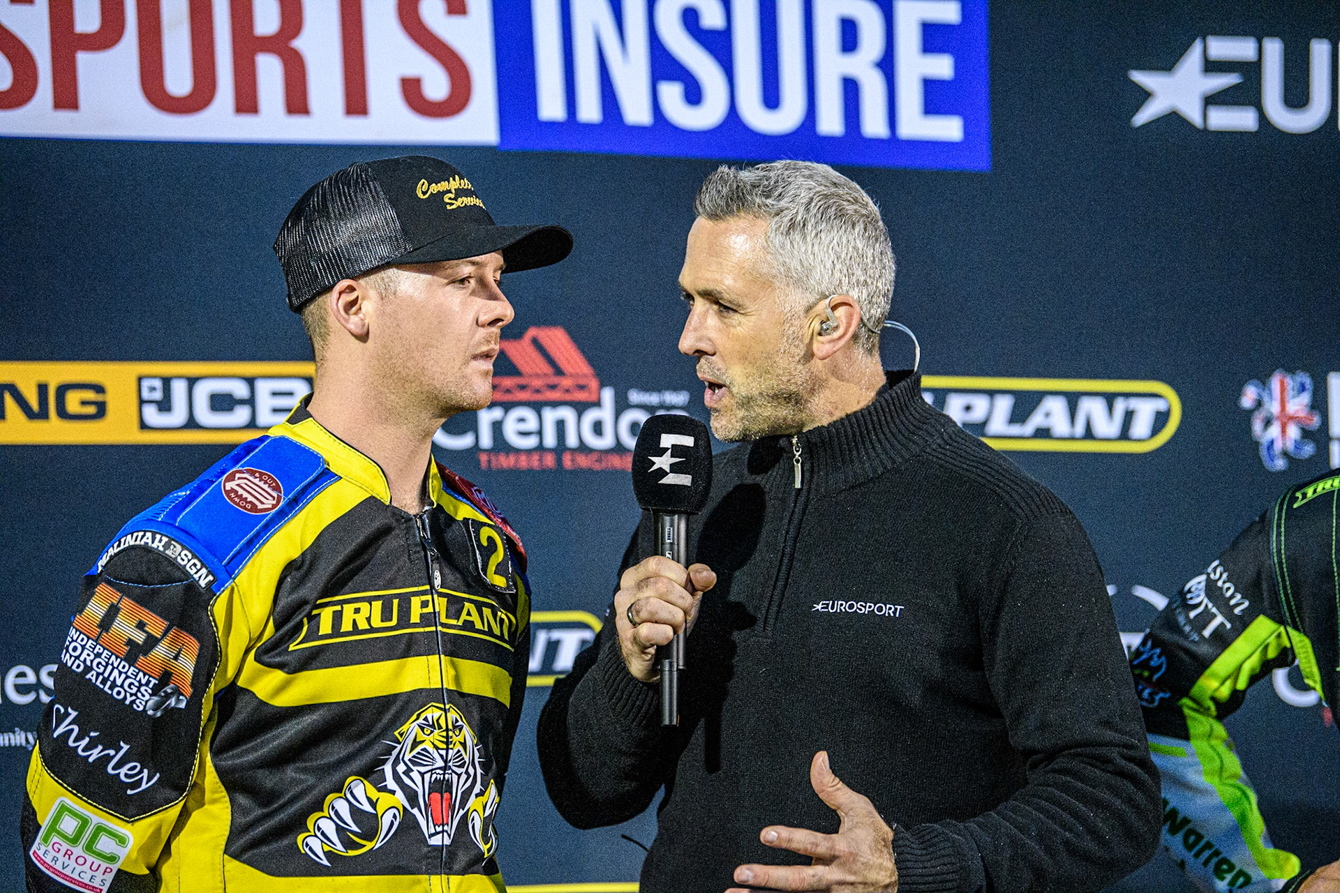 Kyle Howarth (Left) is interviewed by Scott Nicholls for the Eurosport cameras during the Sports Insure Premiership Grand Final Second Leg match between Sheffield Tigers and Ipswich Witches at Owlerton Stadium, Sheffield on Thursday 5th October 2023. (Photo: Ian Charles | MI News)