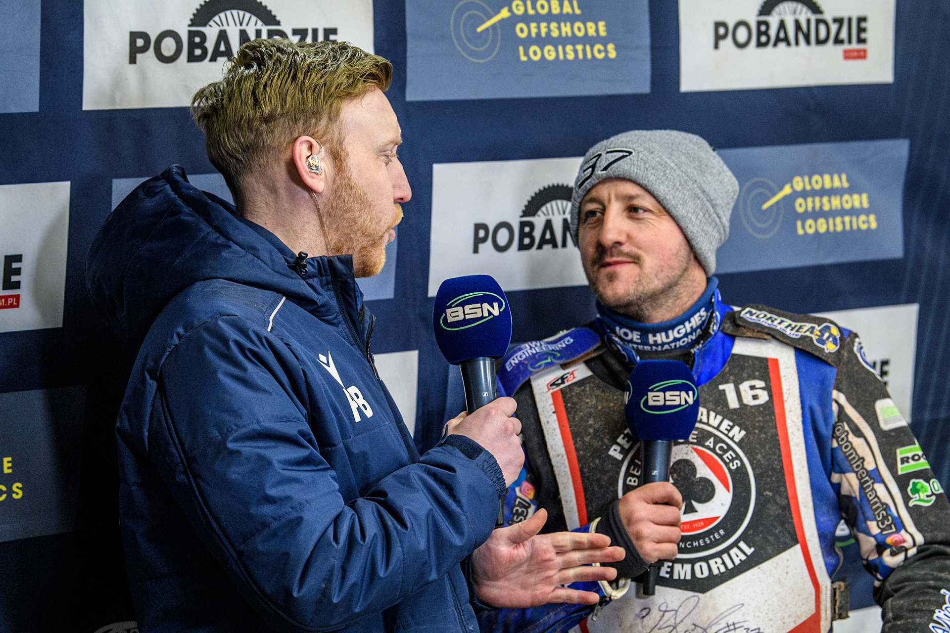 \BSN’s Paul Bowen (Left) interviews England's Chris Harris during the Peter Craven Memorial Trophy meeting at the National Speedway Stadium, Manchester on Monday 18th March 2024. (Photo: Ian Charles | MI News)