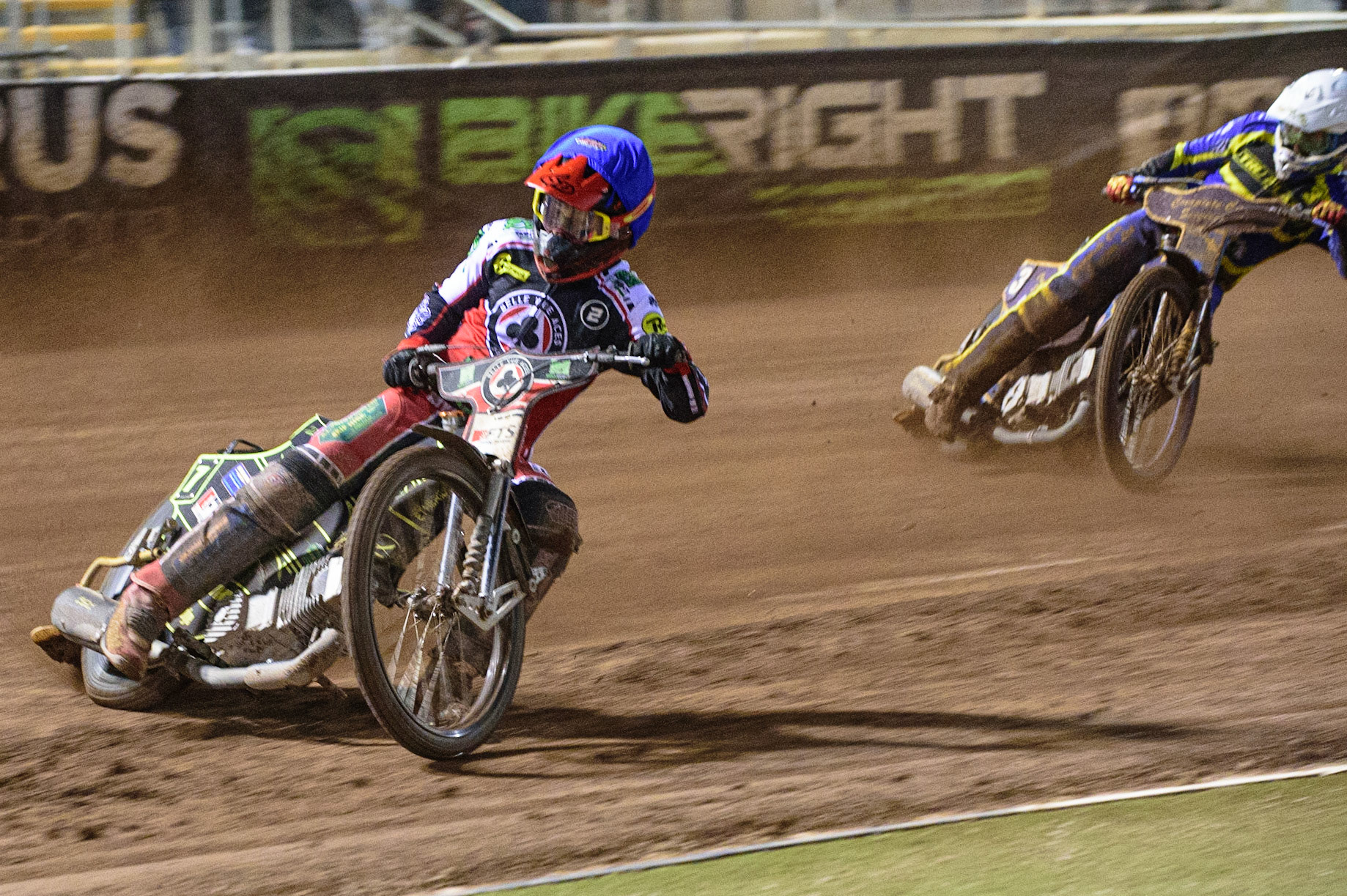 MANCHESTER, UK. OCT 7TH  Jye Etheridge   (Blue) leads Kyle Howarth  (White) during the SGB Premiership Play off Semi-Final Second Leg between Belle Vue Aces and Sheffield Tigers at the National Speedway Stadium, Manchester on Thursday 7th October 2021. (Credit: Ian Charles | MI News)