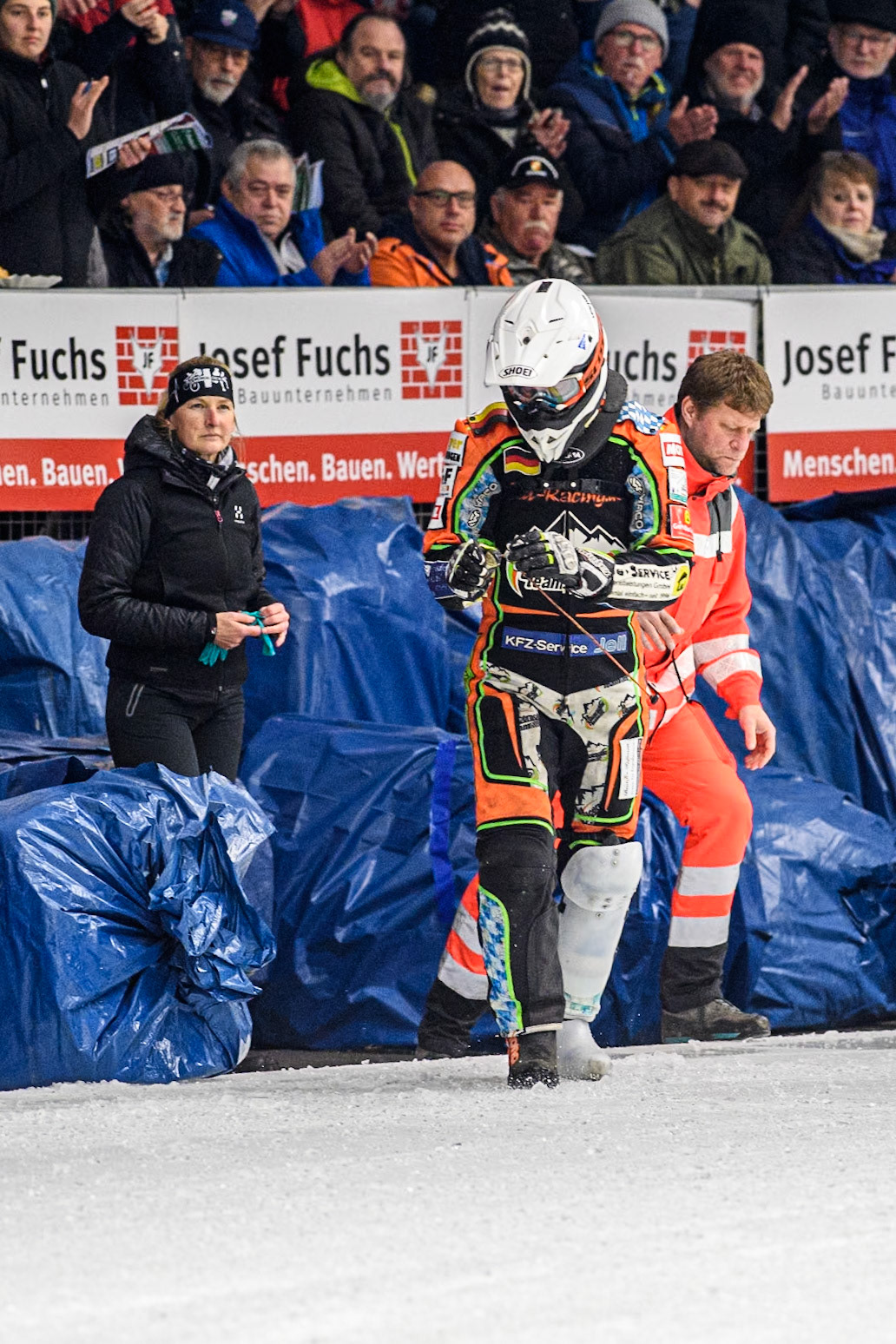 Germany's Markus Jell (82) walks away after his fall during the FIM Ice Speedway Gladiators World Championship Final 1 at the Max-Aicher-Arena, Inzell on Saturday 23 March 2024. (Photo: Ian Charles | MI News)