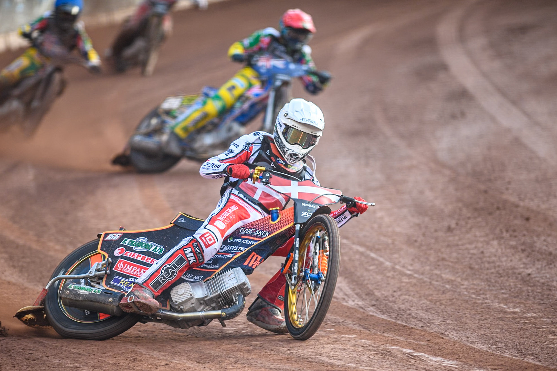 DENMARK v AUSTRALIA: Mikkel Michelsen of Denmark in White leading Jack Holder of Australia in Red during the Monster Energy FIM Speedway of Nation Final at the National Speedway Stadium, Manchester on Saturday 13th July 2024. (Photo: Ian Charles | MI News)