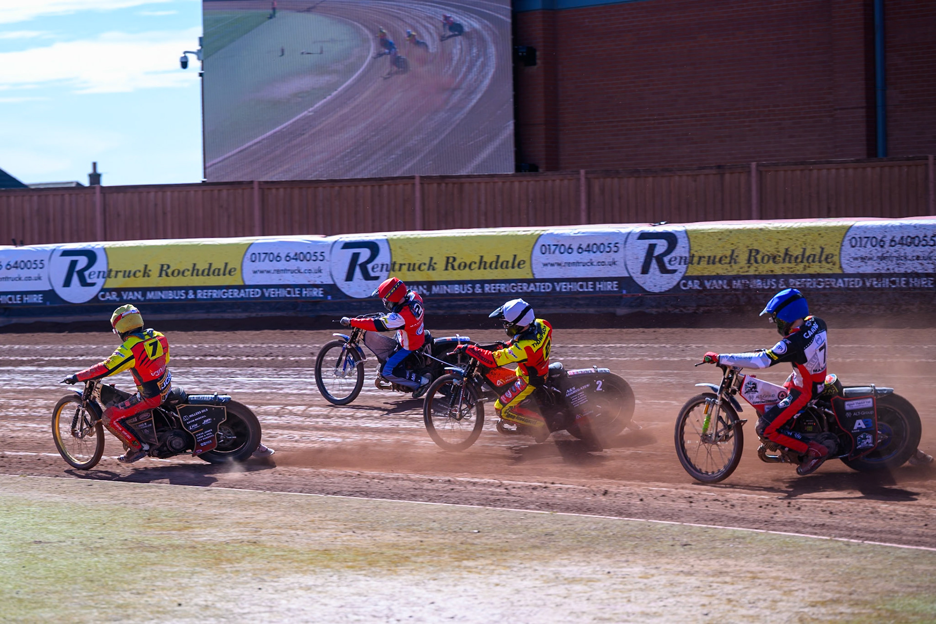 Joe Thompson of Leicester Lions  in Yellow leading Jonas Jeppesen Guest Rider for Belle Vue Aces in Red, Dan Thompson of Leicester Lions  in White and Jonas Jeppesen Guest Rider for Belle Vue Aces in Blue   during the Knockout Cup Northern Section match between Belle Vue Aces and Leicester Lions at the National Speedway Stadium, Manchester on Monday 6th April 2026. (Photo: Ian Charles | MI News)
