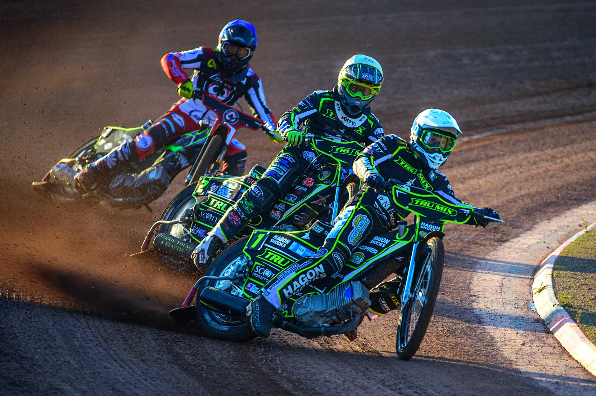 Jason Doyle  (White) and Paul Starke  (Yellow) lead Tom Brennan  (Blue) during the SGB Premiership match between Belle Vue Aces and Ipswich Witches at the National Speedway Stadium, Manchester on Monday 8th August 2022. (Credit: Ian Charles | MI News)